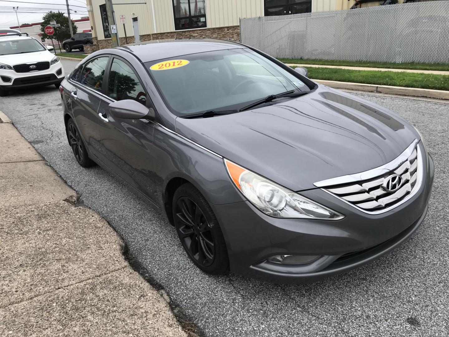 2012 Gray /Gray Hyundai Sonata Limited Auto (5NPEC4AC4CH) with an 2.4L L4 DOHC 16V engine, 6-Speed Automatic transmission, located at 577 Chester Pike, Prospect Park, PA, 19076, (610) 237-1015, 39.886154, -75.302338 - 2012 Hyundai Sonata SE: Only 127k miles, new PA inspection, SUPER CLEAN, runs LIKE NEW! This vehicle comes inspected and has been given a bumper to bumper safety check. It is very clean, reliable, and well maintained. We offer a unique pay plan that is known for being the easiest and fastest fina - Photo#3