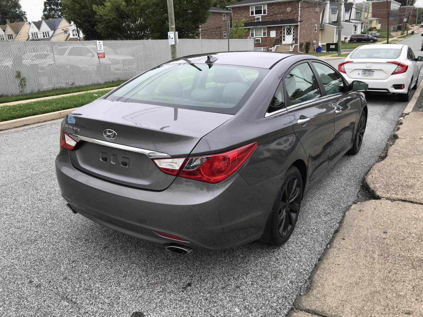 2012 Gray /Gray Hyundai Sonata Limited Auto (5NPEC4AC4CH) with an 2.4L L4 DOHC 16V engine, 6-Speed Automatic transmission, located at 577 Chester Pike, Prospect Park, PA, 19076, (610) 237-1015, 39.886154, -75.302338 - 2012 Hyundai Sonata SE: Only 127k miles, new PA inspection, SUPER CLEAN, runs LIKE NEW! This vehicle comes inspected and has been given a bumper to bumper safety check. It is very clean, reliable, and well maintained. We offer a unique pay plan that is known for being the easiest and fastest fina - Photo#4