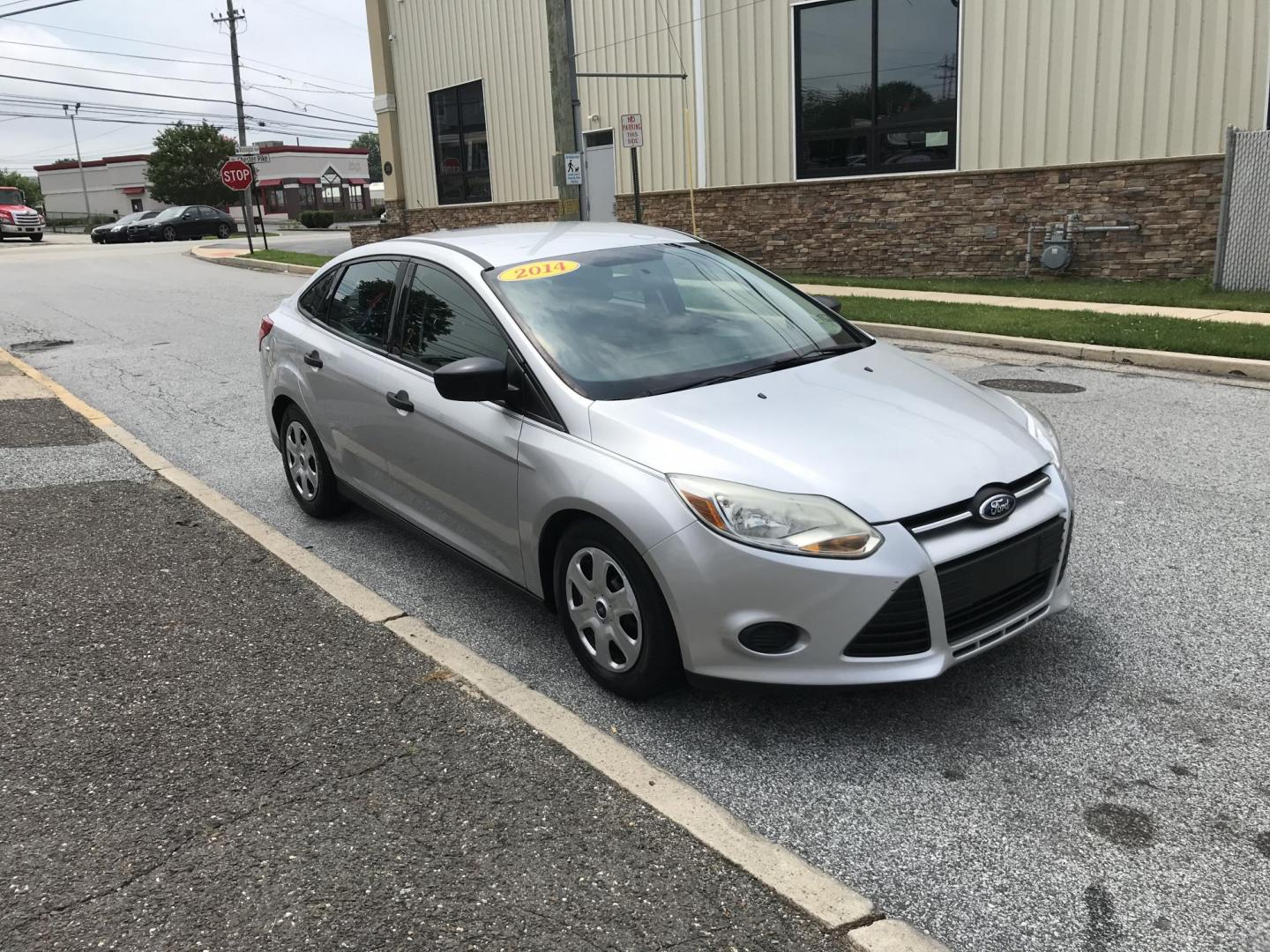 2014 Silver /Gray Ford Focus S Sedan (1FADP3E29EL) with an 2.0L L4 DOHC 16V engine, Automatic transmission, located at 577 Chester Pike, Prospect Park, PA, 19076, (610) 237-1015, 39.886154, -75.302338 - 2014 Ford Focus: Only 93k miles, new PA inspection great on gas, SUPER CLEAN, runs LIKE NEW! This vehicle comes inspected and has been given a bumper to bumper safety check. It is very clean, reliable, and well maintained. We offer a unique pay plan that is known for being the easiest and fastest - Photo#3