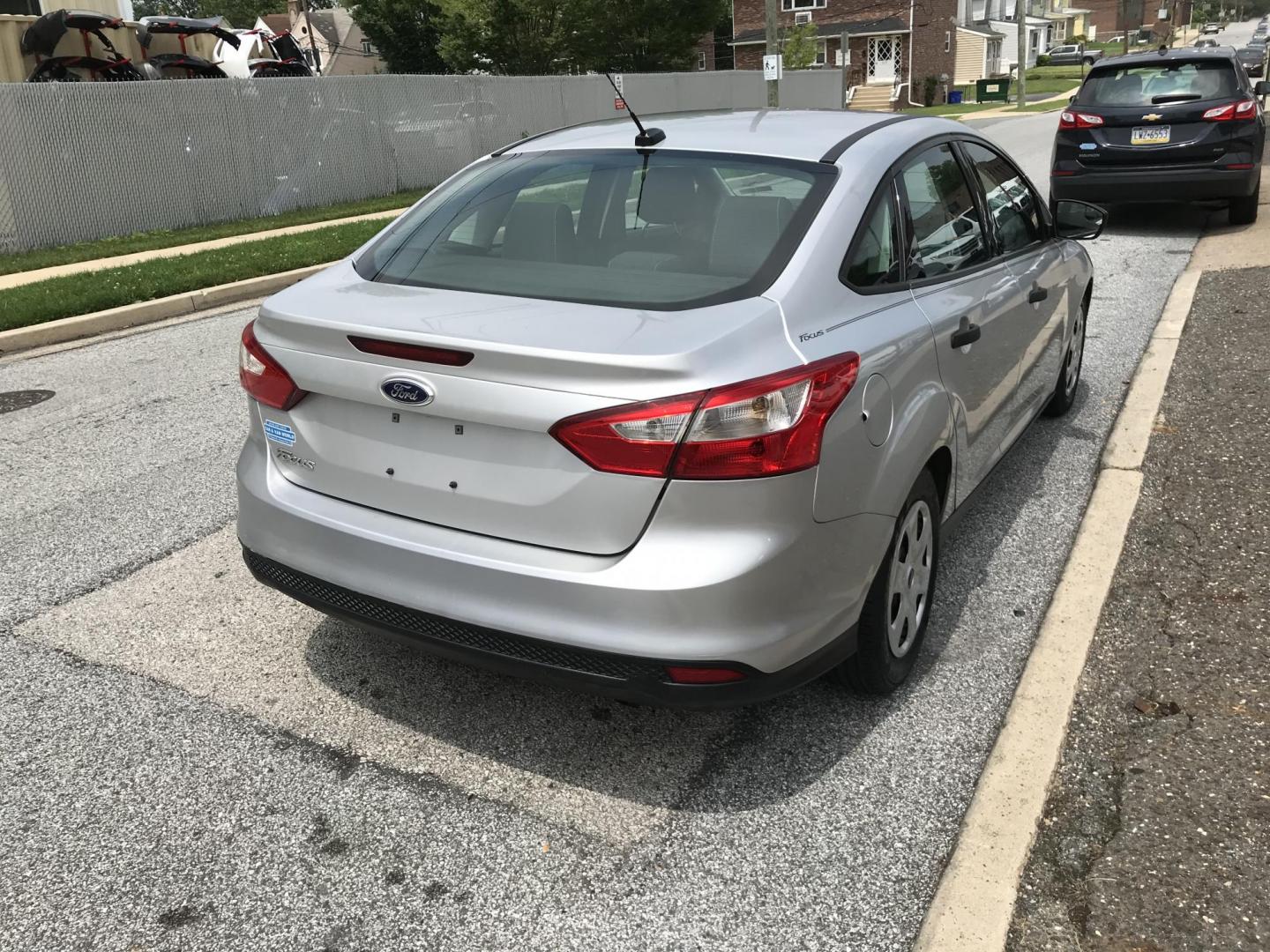 2014 Silver /Gray Ford Focus S Sedan (1FADP3E29EL) with an 2.0L L4 DOHC 16V engine, Automatic transmission, located at 577 Chester Pike, Prospect Park, PA, 19076, (610) 237-1015, 39.886154, -75.302338 - 2014 Ford Focus: Only 93k miles, new PA inspection great on gas, SUPER CLEAN, runs LIKE NEW! This vehicle comes inspected and has been given a bumper to bumper safety check. It is very clean, reliable, and well maintained. We offer a unique pay plan that is known for being the easiest and fastest - Photo#4