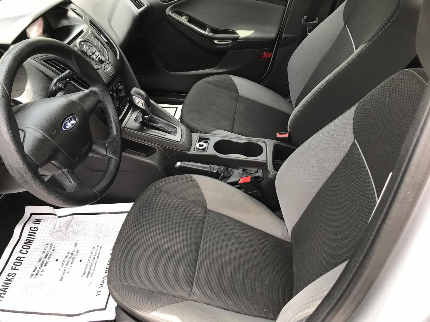 2014 Silver /Gray Ford Focus S Sedan (1FADP3E29EL) with an 2.0L L4 DOHC 16V engine, Automatic transmission, located at 577 Chester Pike, Prospect Park, PA, 19076, (610) 237-1015, 39.886154, -75.302338 - 2014 Ford Focus: Only 93k miles, new PA inspection great on gas, SUPER CLEAN, runs LIKE NEW! This vehicle comes inspected and has been given a bumper to bumper safety check. It is very clean, reliable, and well maintained. We offer a unique pay plan that is known for being the easiest and fastest - Photo#9