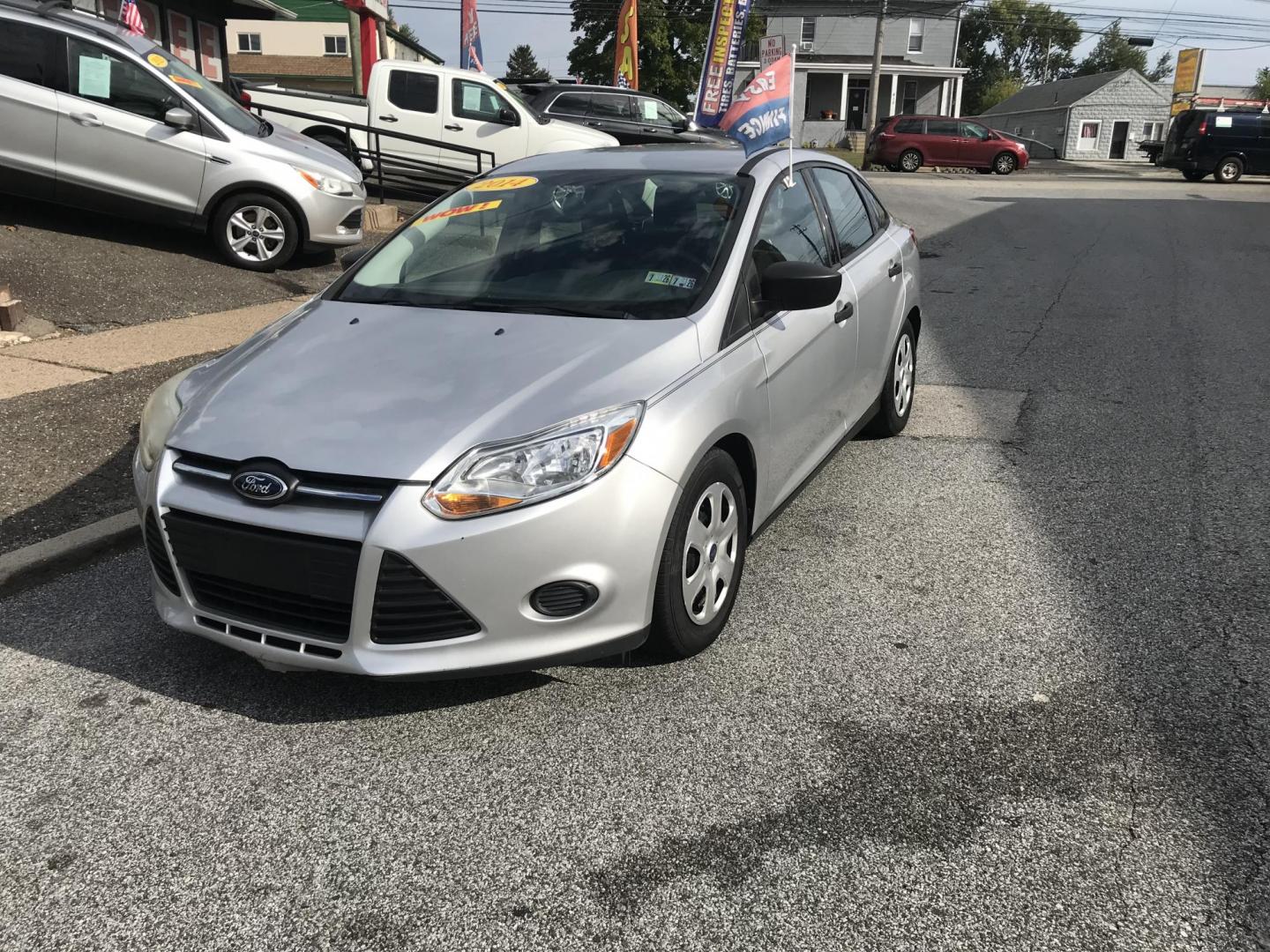 2014 Silver /Gray Ford Focus S Sedan (1FADP3E29EL) with an 2.0L L4 DOHC 16V engine, Automatic transmission, located at 577 Chester Pike, Prospect Park, PA, 19076, (610) 237-1015, 39.886154, -75.302338 - 2014 Ford Focus: Only 94k miles, new PA inspection great on gas, SUPER CLEAN, runs LIKE NEW! This vehicle comes inspected and has been given a bumper to bumper safety check. It is very clean, reliable, and well maintained. We offer a unique pay plan that is known for being the easiest and fastest - Photo#2