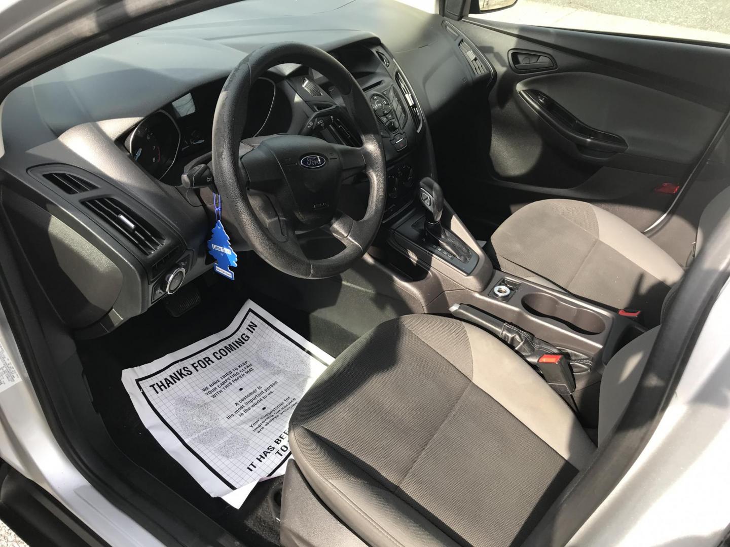 2014 Silver /Gray Ford Focus S Sedan (1FADP3E29EL) with an 2.0L L4 DOHC 16V engine, Automatic transmission, located at 577 Chester Pike, Prospect Park, PA, 19076, (610) 237-1015, 39.886154, -75.302338 - 2014 Ford Focus: Only 94k miles, new PA inspection great on gas, SUPER CLEAN, runs LIKE NEW! This vehicle comes inspected and has been given a bumper to bumper safety check. It is very clean, reliable, and well maintained. We offer a unique pay plan that is known for being the easiest and fastest - Photo#4