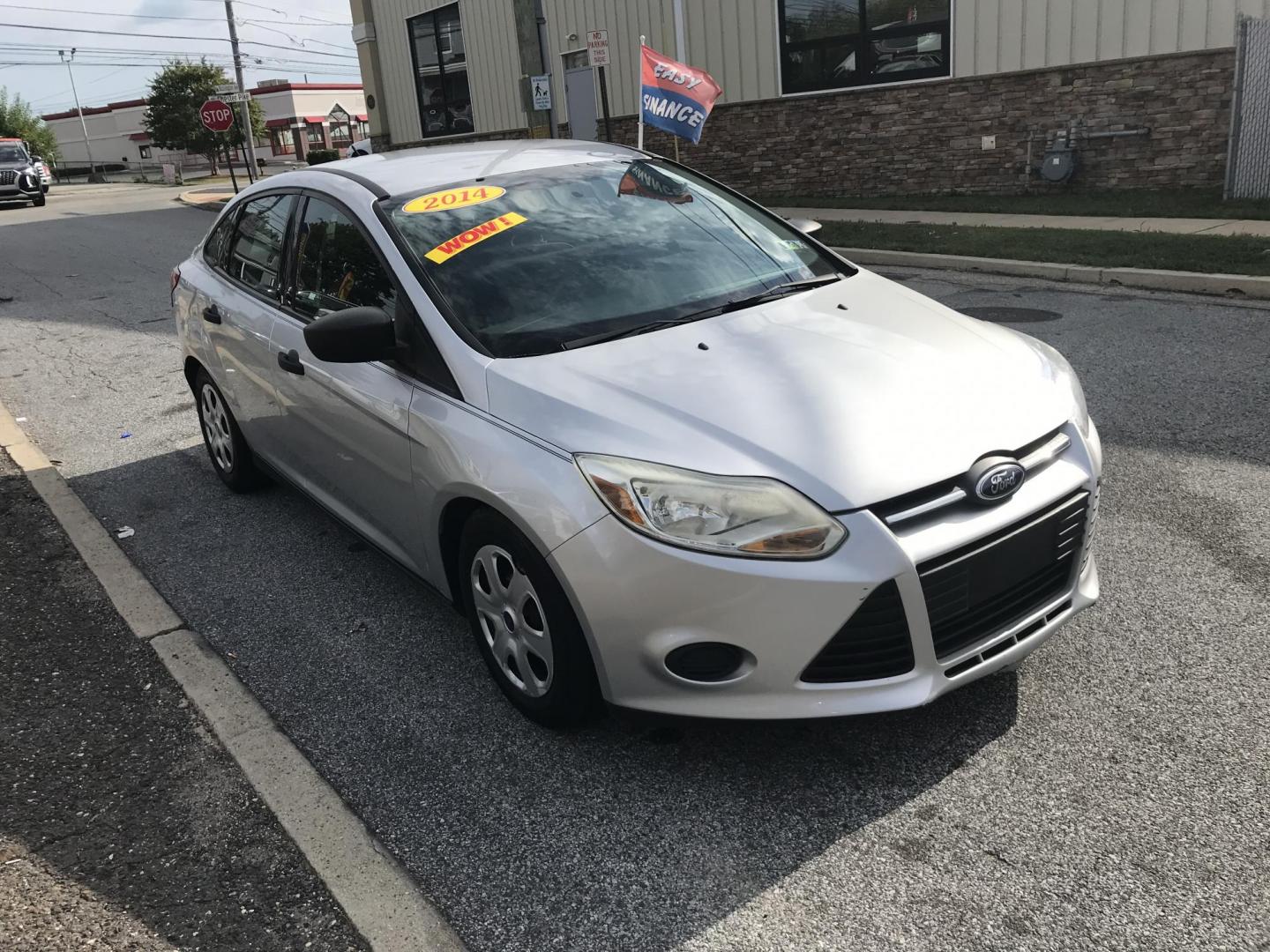 2014 Silver /Gray Ford Focus S Sedan (1FADP3E29EL) with an 2.0L L4 DOHC 16V engine, Automatic transmission, located at 577 Chester Pike, Prospect Park, PA, 19076, (610) 237-1015, 39.886154, -75.302338 - 2014 Ford Focus: Only 94k miles, new PA inspection great on gas, SUPER CLEAN, runs LIKE NEW! This vehicle comes inspected and has been given a bumper to bumper safety check. It is very clean, reliable, and well maintained. We offer a unique pay plan that is known for being the easiest and fastest - Photo#3