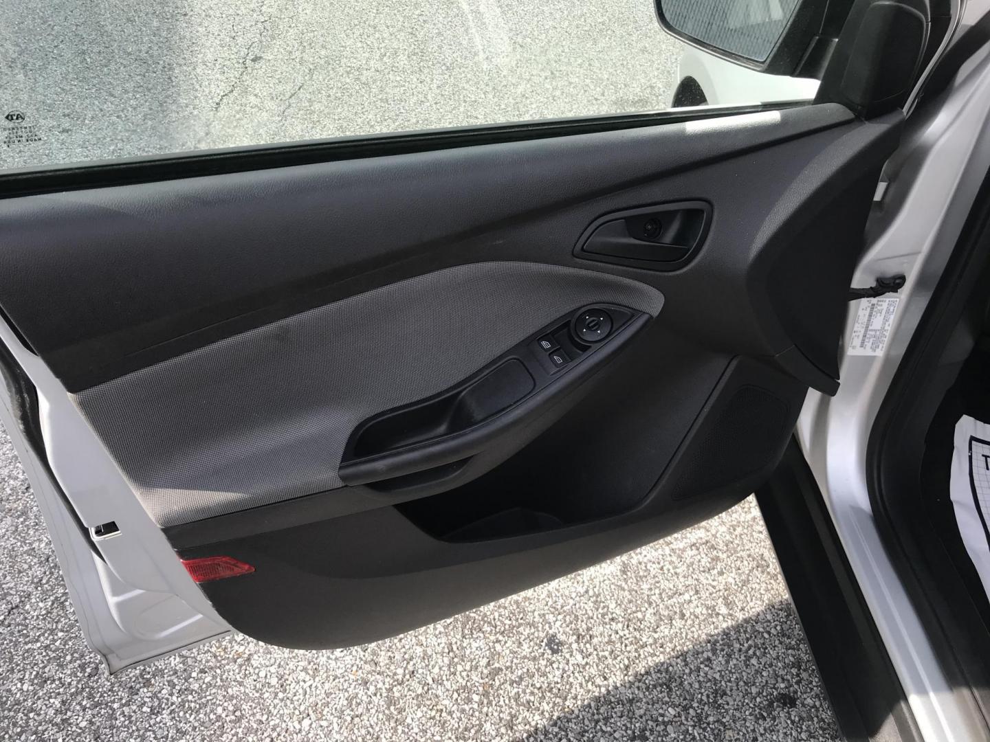 2014 Silver /Gray Ford Focus S Sedan (1FADP3E29EL) with an 2.0L L4 DOHC 16V engine, Automatic transmission, located at 577 Chester Pike, Prospect Park, PA, 19076, (610) 237-1015, 39.886154, -75.302338 - 2014 Ford Focus: Only 94k miles, new PA inspection great on gas, SUPER CLEAN, runs LIKE NEW! This vehicle comes inspected and has been given a bumper to bumper safety check. It is very clean, reliable, and well maintained. We offer a unique pay plan that is known for being the easiest and fastest - Photo#5