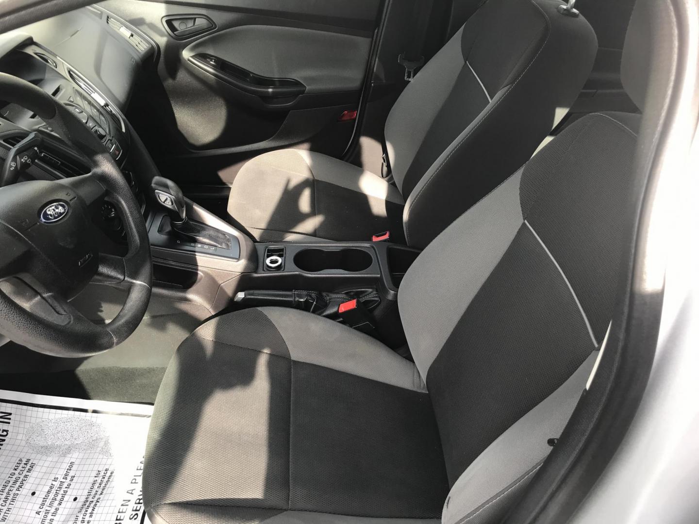 2014 Silver /Gray Ford Focus S Sedan (1FADP3E29EL) with an 2.0L L4 DOHC 16V engine, Automatic transmission, located at 577 Chester Pike, Prospect Park, PA, 19076, (610) 237-1015, 39.886154, -75.302338 - 2014 Ford Focus: Only 94k miles, new PA inspection great on gas, SUPER CLEAN, runs LIKE NEW! This vehicle comes inspected and has been given a bumper to bumper safety check. It is very clean, reliable, and well maintained. We offer a unique pay plan that is known for being the easiest and fastest - Photo#6