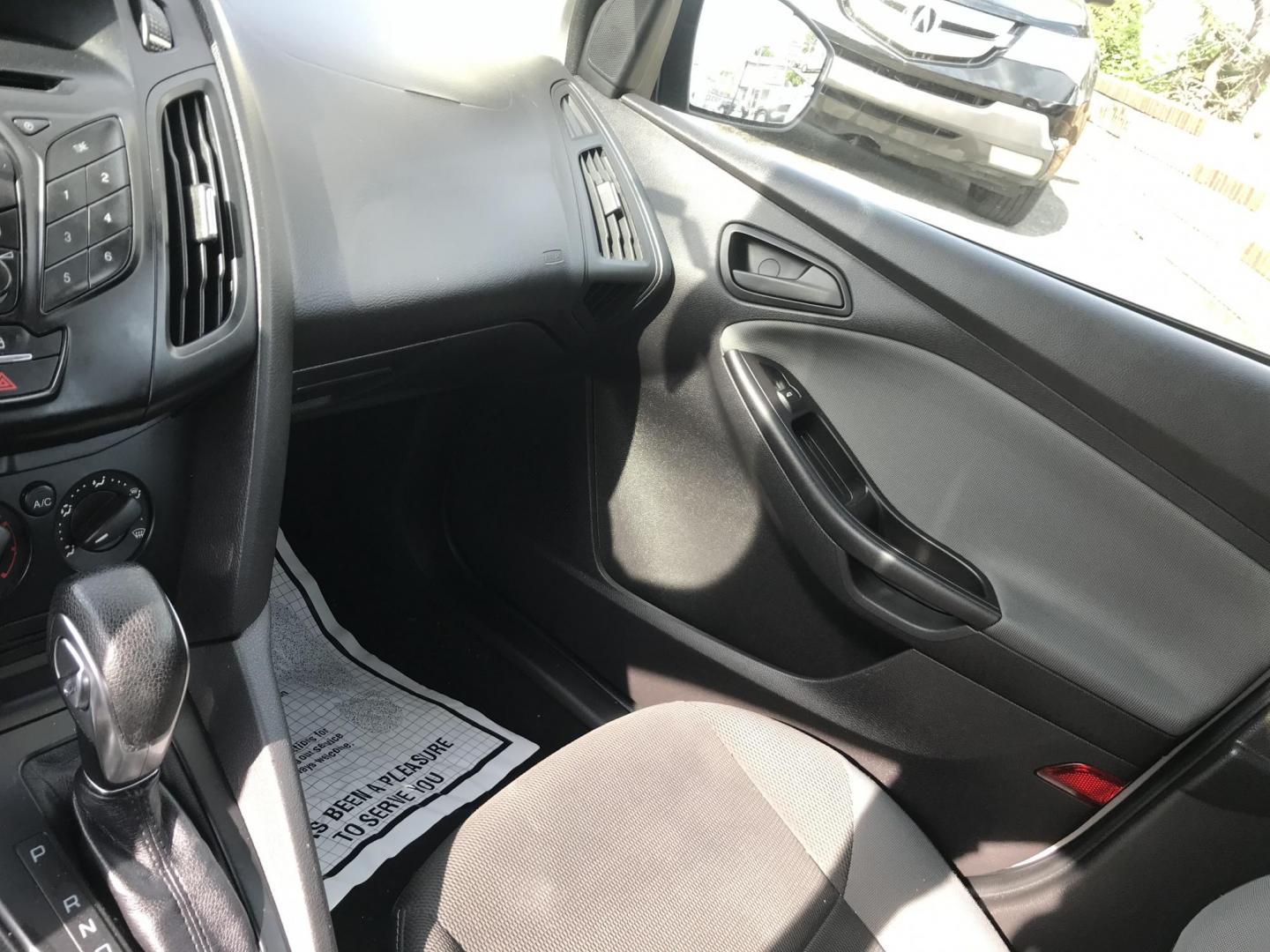 2014 Silver /Gray Ford Focus S Sedan (1FADP3E29EL) with an 2.0L L4 DOHC 16V engine, Automatic transmission, located at 577 Chester Pike, Prospect Park, PA, 19076, (610) 237-1015, 39.886154, -75.302338 - 2014 Ford Focus: Only 94k miles, new PA inspection great on gas, SUPER CLEAN, runs LIKE NEW! This vehicle comes inspected and has been given a bumper to bumper safety check. It is very clean, reliable, and well maintained. We offer a unique pay plan that is known for being the easiest and fastest - Photo#11