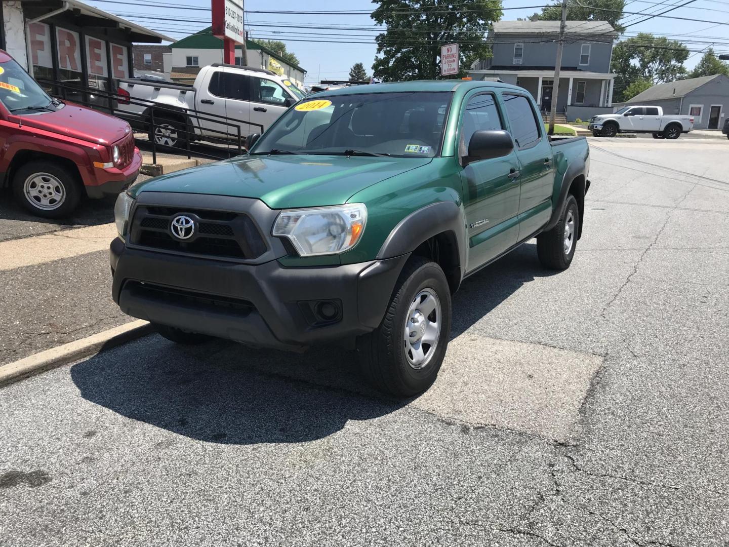 2014 Green /Black Toyota Tacoma Double Cab V6 4WD (5TFLU4EN2EX) with an 4.0L V6 DOHC 24V engine, Automatic transmission, located at 577 Chester Pike, Prospect Park, PA, 19076, (610) 237-1015, 39.886154, -75.302338 - 2014 Toyota Tacoma: Double Cab, 4x4, new PA inspection, runs STRONG! This vehicle comes inspected and has been given a bumper to bumper safety check. It is very clean, reliable, and well maintained. We offer a unique pay plan that is known for being the easiest and fastest financing option in the - Photo#2