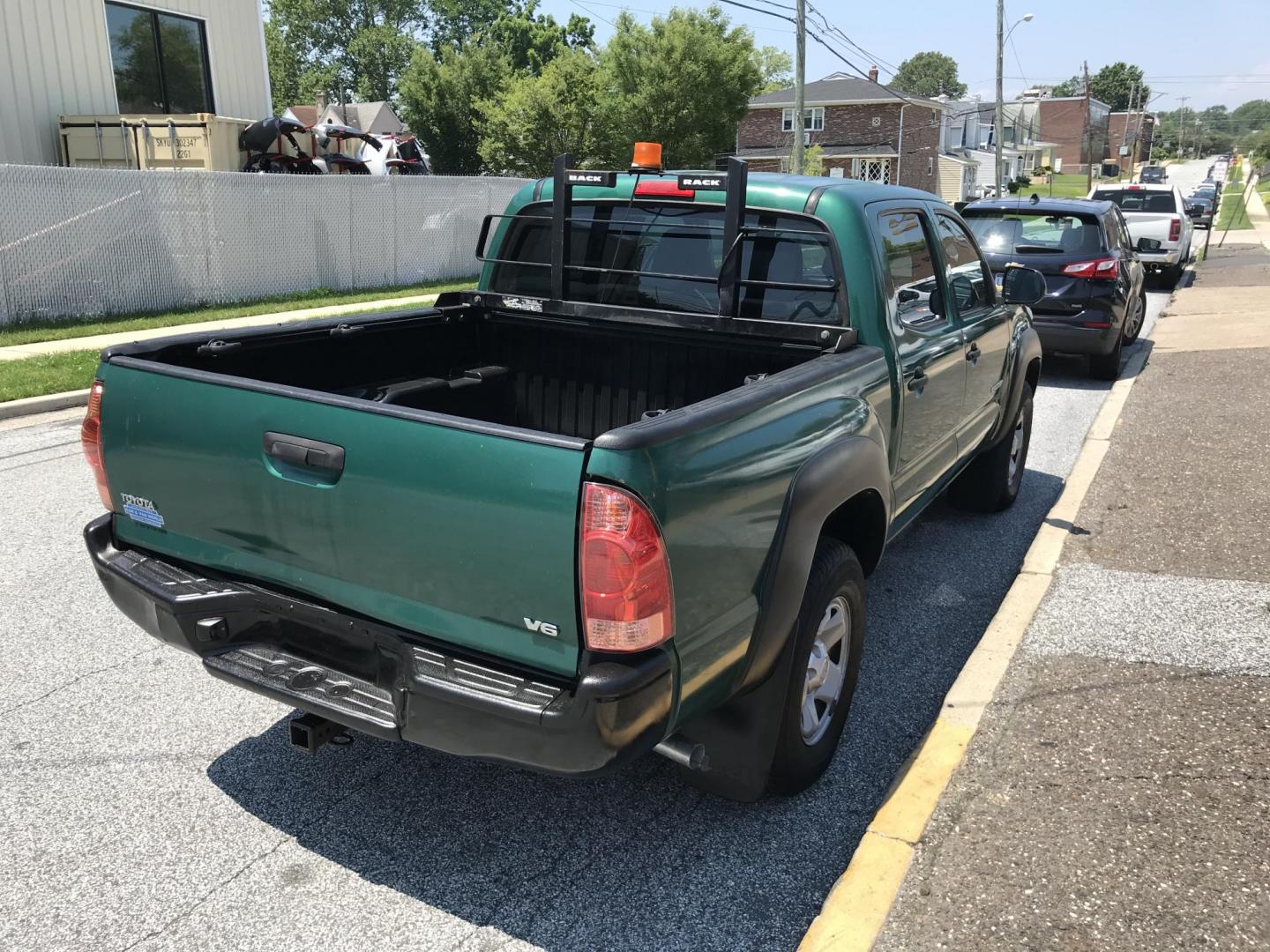 2014 Green /Black Toyota Tacoma Double Cab V6 4WD (5TFLU4EN2EX) with an 4.0L V6 DOHC 24V engine, Automatic transmission, located at 577 Chester Pike, Prospect Park, PA, 19076, (610) 237-1015, 39.886154, -75.302338 - 2014 Toyota Tacoma: Double Cab, 4x4, new PA inspection, runs STRONG! This vehicle comes inspected and has been given a bumper to bumper safety check. It is very clean, reliable, and well maintained. We offer a unique pay plan that is known for being the easiest and fastest financing option in the - Photo#4