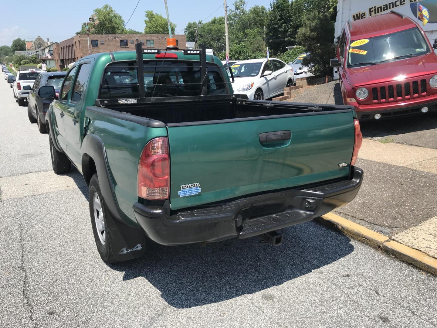 2014 Green /Black Toyota Tacoma Double Cab V6 4WD (5TFLU4EN2EX) with an 4.0L V6 DOHC 24V engine, Automatic transmission, located at 577 Chester Pike, Prospect Park, PA, 19076, (610) 237-1015, 39.886154, -75.302338 - 2014 Toyota Tacoma: Double Cab, 4x4, new PA inspection, runs STRONG! This vehicle comes inspected and has been given a bumper to bumper safety check. It is very clean, reliable, and well maintained. We offer a unique pay plan that is known for being the easiest and fastest financing option in the - Photo#5