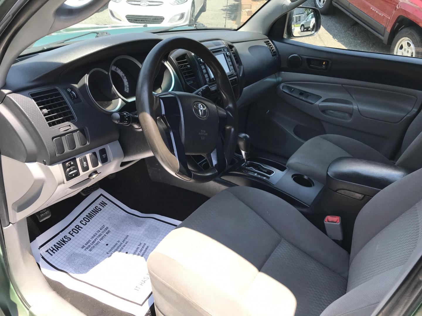 2014 Green /Black Toyota Tacoma Double Cab V6 4WD (5TFLU4EN2EX) with an 4.0L V6 DOHC 24V engine, Automatic transmission, located at 577 Chester Pike, Prospect Park, PA, 19076, (610) 237-1015, 39.886154, -75.302338 - 2014 Toyota Tacoma: Double Cab, 4x4, new PA inspection, runs STRONG! This vehicle comes inspected and has been given a bumper to bumper safety check. It is very clean, reliable, and well maintained. We offer a unique pay plan that is known for being the easiest and fastest financing option in the - Photo#9