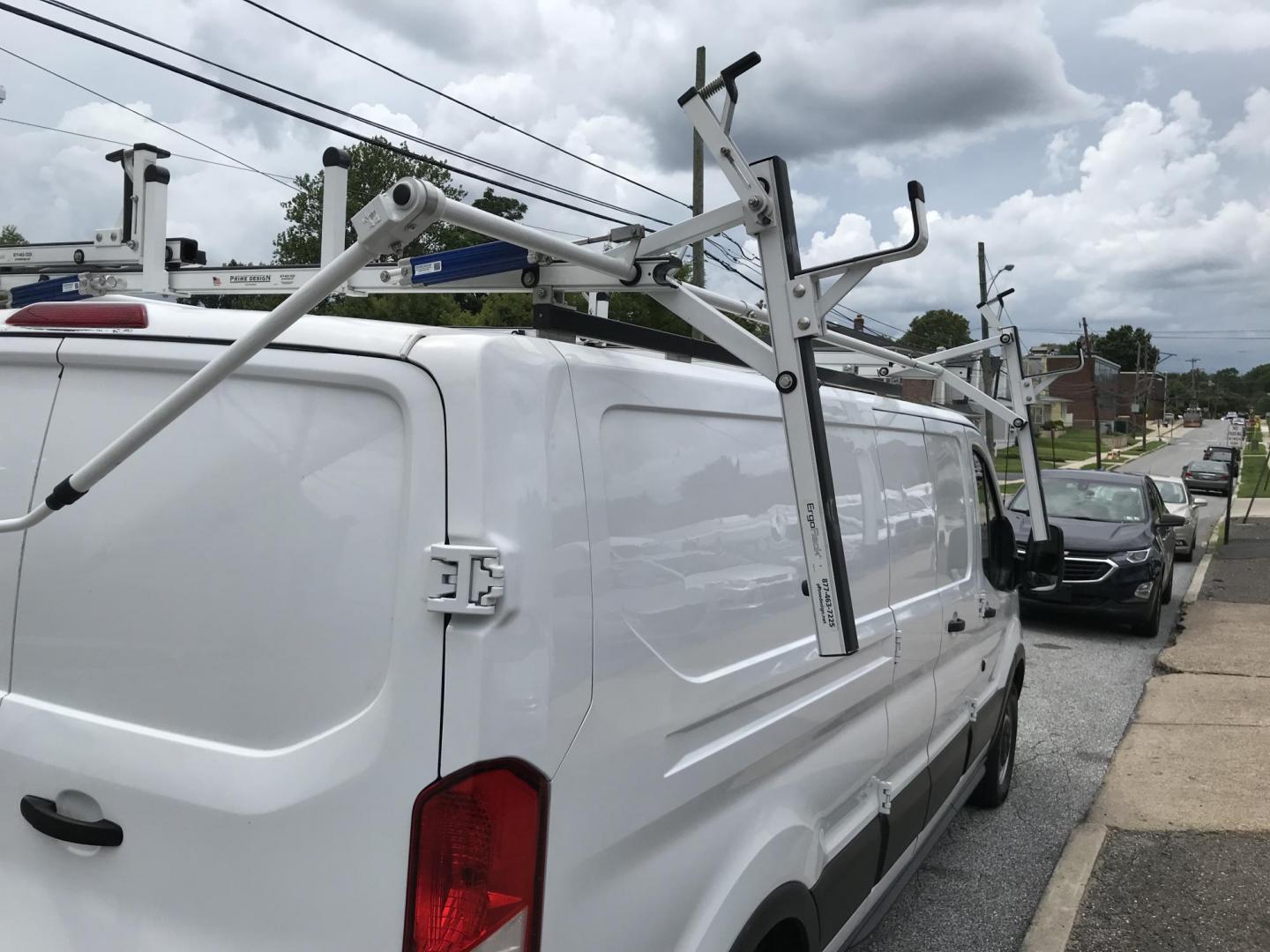 2016 White /Gray Ford Transit 250 Van Low Roof 60/40 Pass. 148-in. WB (1FTYR2ZM8GK) with an 3.7L V6 DOHC 24V engine, 6A transmission, located at 577 Chester Pike, Prospect Park, PA, 19076, (610) 237-1015, 39.886154, -75.302338 - 2016 Ford Transit 250: Extended body, dual drop down ladder racks, multiple pieces of shelving, partition, no side or rear windows, new PA inspection, FLEET MAINTAINED! This vehicle comes inspected and has been given a bumper to bumper safety check. It is very clean, reliable, and well maintained - Photo#6