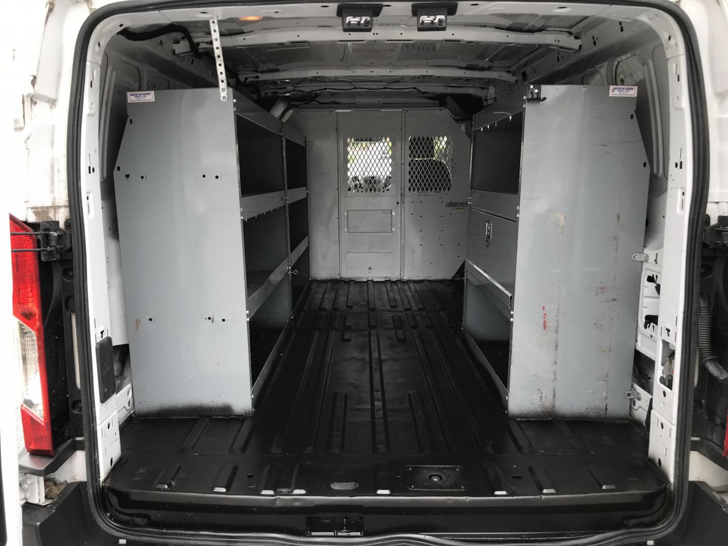 2016 White /Gray Ford Transit 250 Van Low Roof 60/40 Pass. 148-in. WB (1FTYR2ZM8GK) with an 3.7L V6 DOHC 24V engine, 6A transmission, located at 577 Chester Pike, Prospect Park, PA, 19076, (610) 237-1015, 39.886154, -75.302338 - 2016 Ford Transit 250: Extended body, dual drop down ladder racks, multiple pieces of shelving, partition, no side or rear windows, new PA inspection, FLEET MAINTAINED! This vehicle comes inspected and has been given a bumper to bumper safety check. It is very clean, reliable, and well maintained - Photo#14