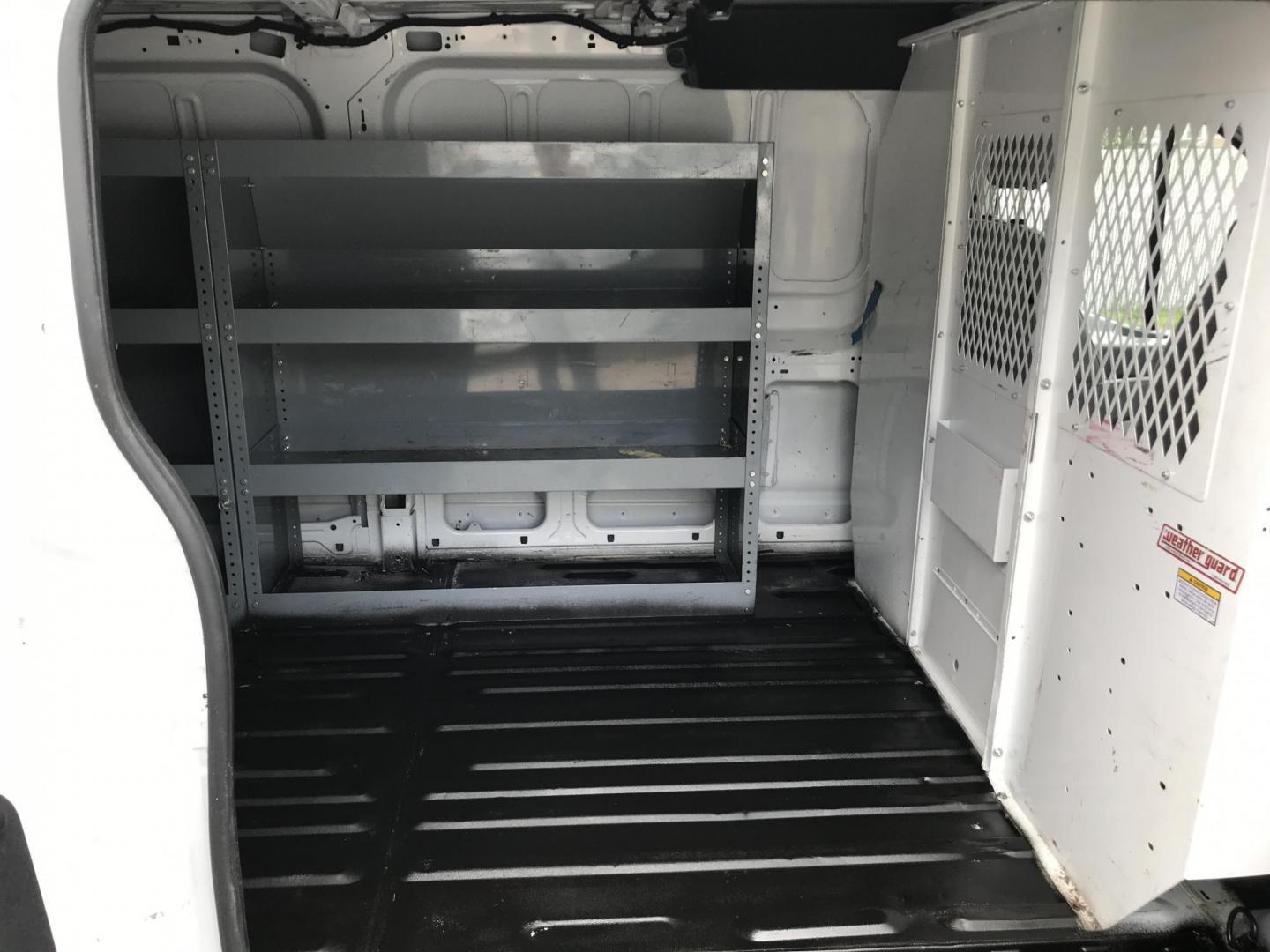2016 White /Gray Ford Transit 250 Van Low Roof 60/40 Pass. 148-in. WB (1FTYR2ZM8GK) with an 3.7L V6 DOHC 24V engine, 6A transmission, located at 577 Chester Pike, Prospect Park, PA, 19076, (610) 237-1015, 39.886154, -75.302338 - 2016 Ford Transit 250: Extended body, dual drop down ladder racks, multiple pieces of shelving, partition, no side or rear windows, new PA inspection, FLEET MAINTAINED! This vehicle comes inspected and has been given a bumper to bumper safety check. It is very clean, reliable, and well maintained - Photo#17