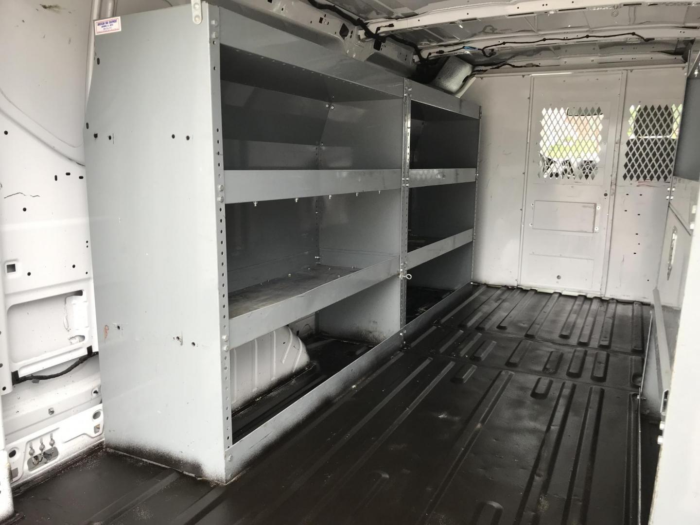 2016 White /Gray Ford Transit 250 Van Low Roof 60/40 Pass. 148-in. WB (1FTYR2ZM8GK) with an 3.7L V6 DOHC 24V engine, 6A transmission, located at 577 Chester Pike, Prospect Park, PA, 19076, (610) 237-1015, 39.886154, -75.302338 - 2016 Ford Transit 250: Extended body, dual drop down ladder racks, multiple pieces of shelving, partition, no side or rear windows, new PA inspection, FLEET MAINTAINED! This vehicle comes inspected and has been given a bumper to bumper safety check. It is very clean, reliable, and well maintained - Photo#15