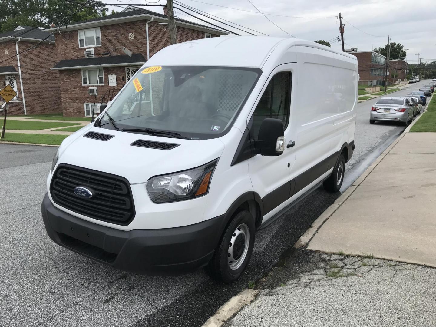 2019 White /Gray Ford Transit 250 Van Med. Roof w/Sliding Pass. 148-in. WB (1FTYR2CMXKK) with an 3.7L V6 DOHC 24V engine, 6A transmission, located at 577 Chester Pike, Prospect Park, PA, 19076, (610) 237-1015, 39.886154, -75.302338 - Photo#3