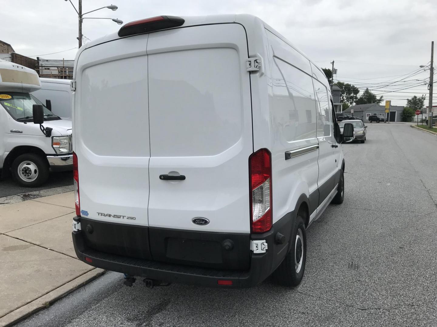 2019 White /Gray Ford Transit 250 Van Med. Roof w/Sliding Pass. 148-in. WB (1FTYR2CMXKK) with an 3.7L V6 DOHC 24V engine, 6A transmission, located at 577 Chester Pike, Prospect Park, PA, 19076, (610) 237-1015, 39.886154, -75.302338 - Photo#6