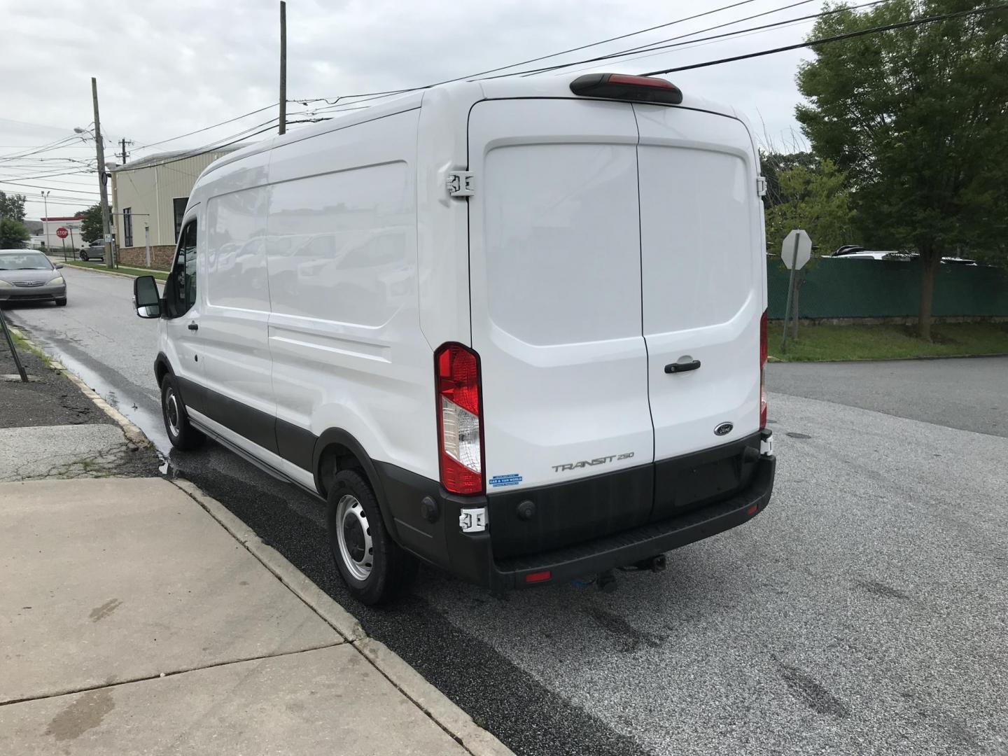 2019 White /Gray Ford Transit 250 Van Med. Roof w/Sliding Pass. 148-in. WB (1FTYR2CMXKK) with an 3.7L V6 DOHC 24V engine, 6A transmission, located at 577 Chester Pike, Prospect Park, PA, 19076, (610) 237-1015, 39.886154, -75.302338 - Photo#5