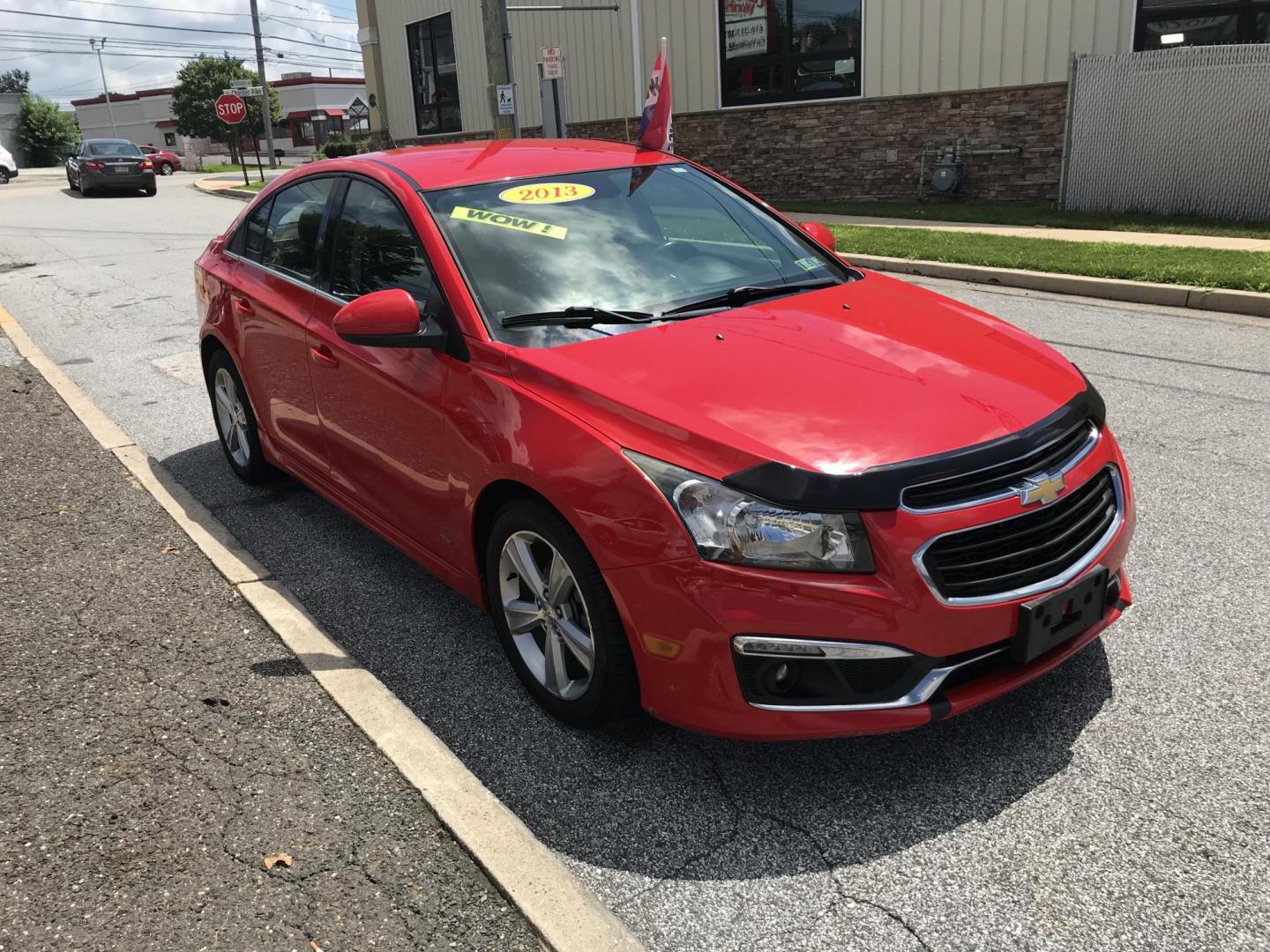 2015 Red /Black Chevrolet Cruze 2LT Auto (1G1PE5SB1F7) with an 1.4L L4 DOHC 16V TURBO engine, 6-Speed Automatic transmission, located at 577 Chester Pike, Prospect Park, PA, 19076, (610) 237-1015, 39.886154, -75.302338 - 2015 Chevrolet Cruze 2LT: Only 102k miles, great on gas, black leather interior, SUPER CLEAN, runs LIKE NEW! This vehicle comes inspected and has been given a bumper to bumper safety check. It is very clean, reliable, and well maintained. We offer a unique pay plan that is known for being the eas - Photo#3