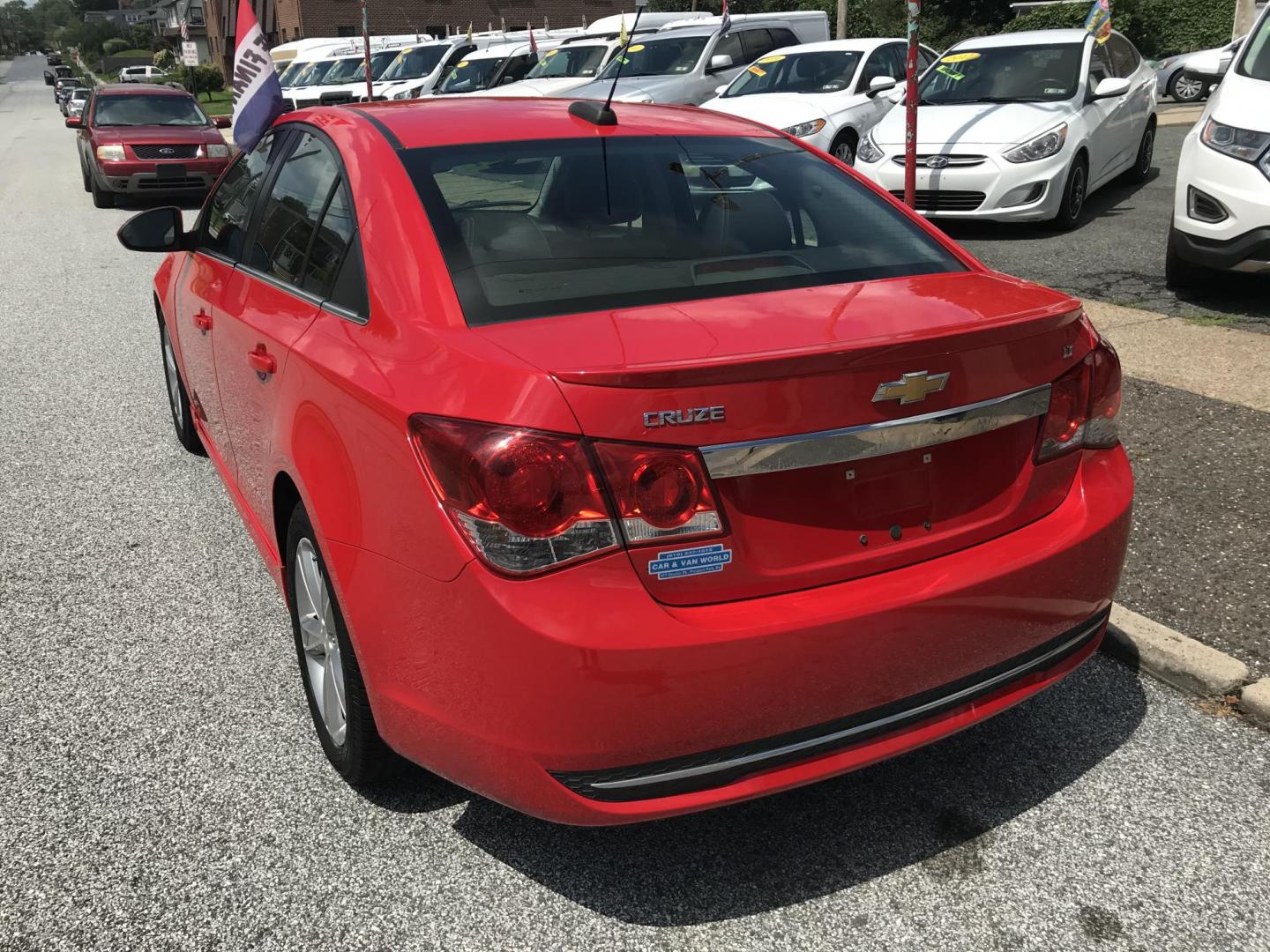 2015 Red /Black Chevrolet Cruze 2LT Auto (1G1PE5SB1F7) with an 1.4L L4 DOHC 16V TURBO engine, 6-Speed Automatic transmission, located at 577 Chester Pike, Prospect Park, PA, 19076, (610) 237-1015, 39.886154, -75.302338 - 2015 Chevrolet Cruze 2LT: Only 102k miles, great on gas, black leather interior, SUPER CLEAN, runs LIKE NEW! This vehicle comes inspected and has been given a bumper to bumper safety check. It is very clean, reliable, and well maintained. We offer a unique pay plan that is known for being the eas - Photo#5