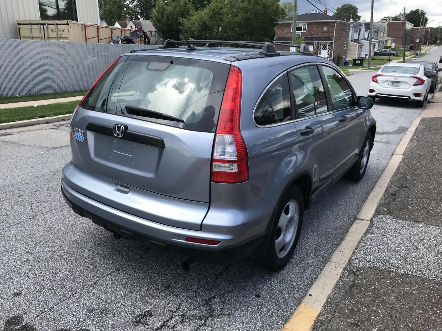 2011 Blue /Gray Honda CR-V LX (5J6RE3H37BL) with an 2.4L L4 DOHC 16V engine, 5-Speed Automatic transmission, located at 577 Chester Pike, Prospect Park, PA, 19076, (610) 237-1015, 39.886154, -75.302338 - Photo#4