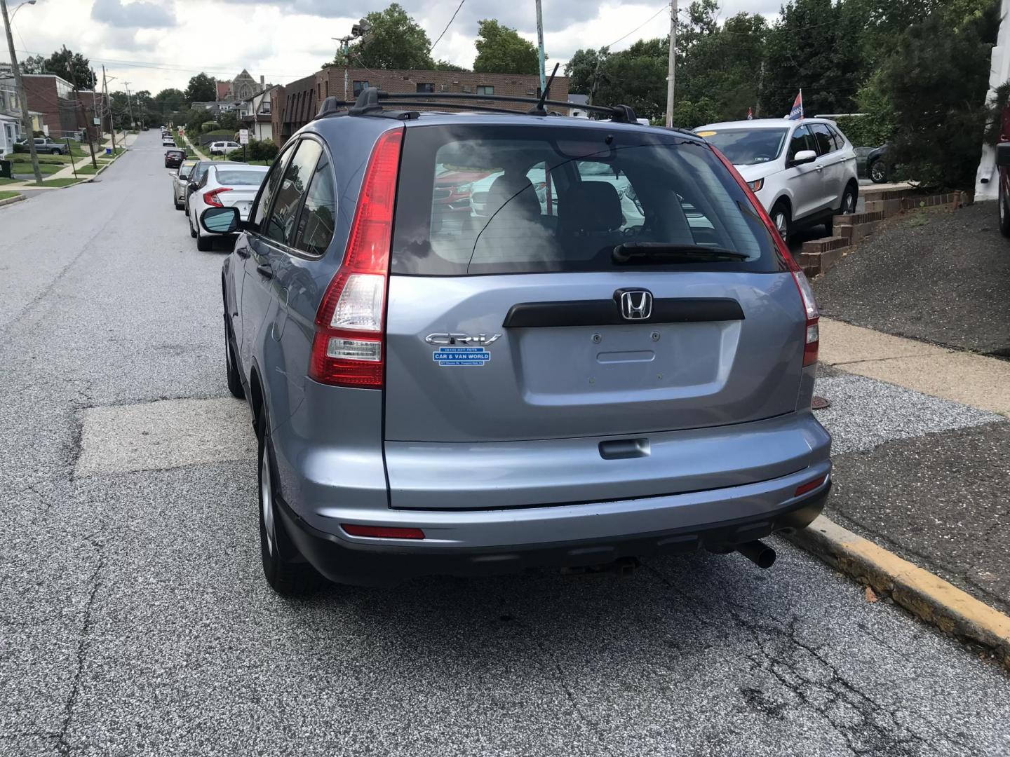 2011 Blue /Gray Honda CR-V LX (5J6RE3H37BL) with an 2.4L L4 DOHC 16V engine, 5-Speed Automatic transmission, located at 577 Chester Pike, Prospect Park, PA, 19076, (610) 237-1015, 39.886154, -75.302338 - Photo#5