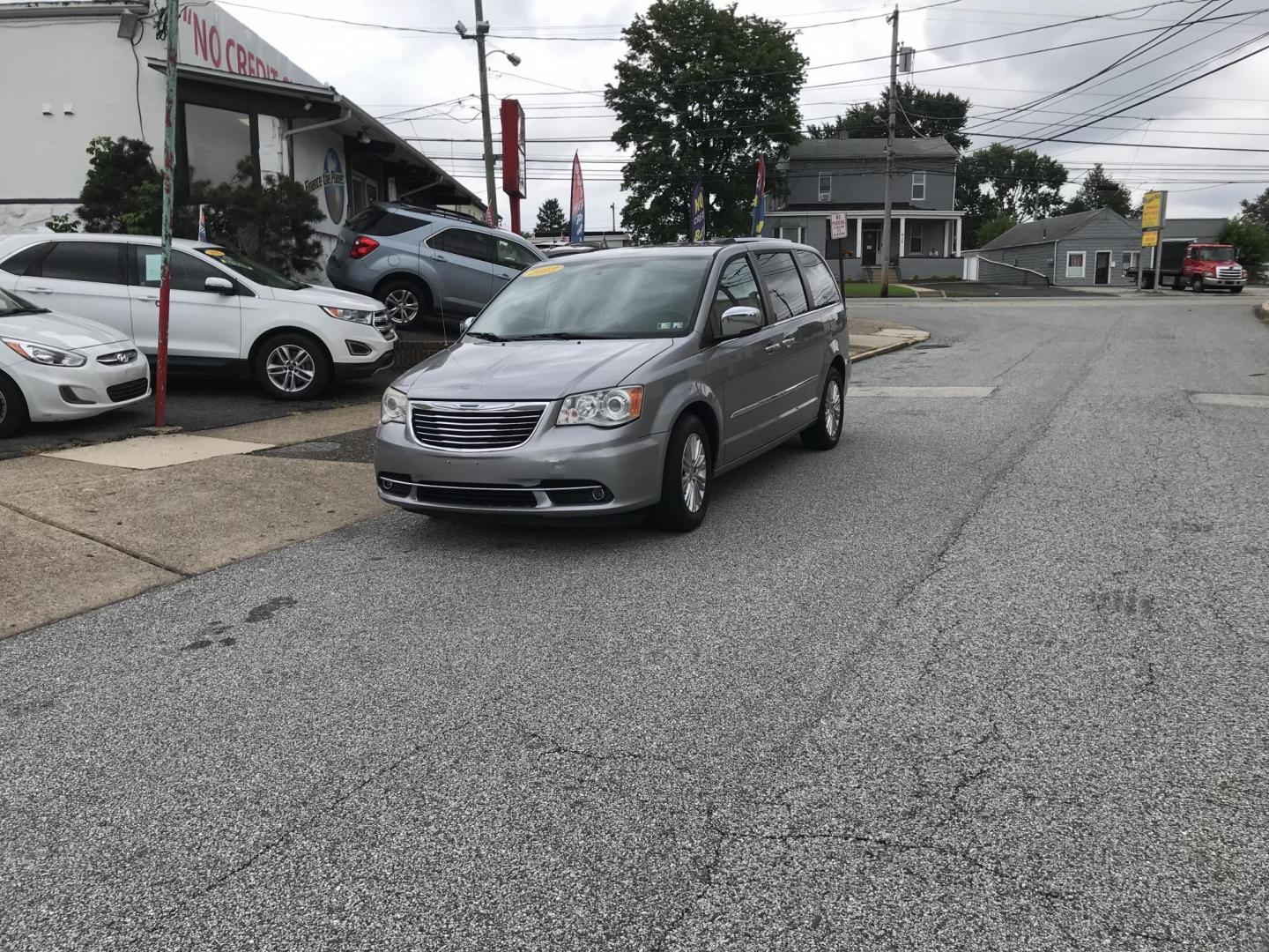 2013 Silver /Gray Chrysler Town & Country Limited (2C4RC1GG3DR) with an 3.6L V6 DOHC 24V engine, 6-Speed Automatic transmission, located at 577 Chester Pike, Prospect Park, PA, 19076, (610) 237-1015, 39.886154, -75.302338 - 2013 Chrylser Town & Country LIMITED: DVD player, navigation system, backup camera, stow and go seating, new PA inspection, runs LIKE NEW! This vehicle comes inspected and has been given a bumper to bumper safety check. It is very clean, reliable, and well maintained. We offer a unique pay plan t - Photo#1