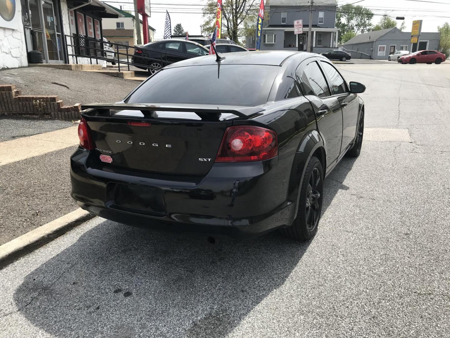 2013 Black /Tan Dodge Avenger SXT (1C3CDZCB1DN) with an 2.4L L4 DOHC 16V engine, 6-Speed Automatic transmission, located at 577 Chester Pike, Prospect Park, PA, 19076, (610) 237-1015, 39.886154, -75.302338 - 2013 Dodge Avenger SXT: Only 116k miles, new PA inspection, SUPER CLEAN, runs LIKE NEW! This vehicle comes inspected and has been given a bumper to bumper safety check. It is very clean, reliable, and well maintained. We offer a unique pay plan that is known for being the easiest and fastest fina - Photo#6