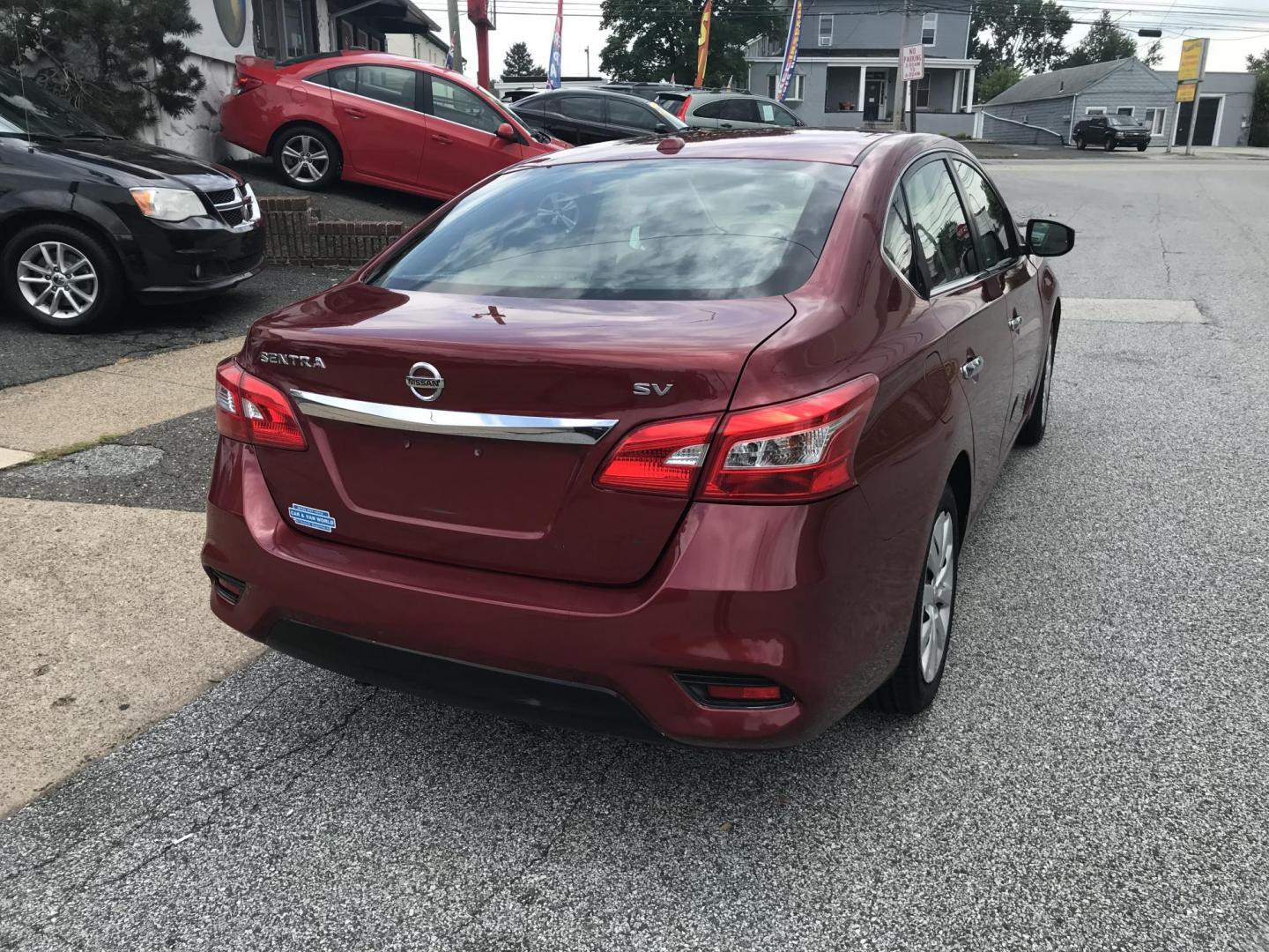 2017 Red /Black Nissan Sentra S (3N1AB7AP9HL) with an 1.8L L4 SFI DOHC 16V engine, Automatic transmission, located at 577 Chester Pike, Prospect Park, PA, 19076, (610) 237-1015, 39.886154, -75.302338 - 2017 Nissan Sentra: Only 103k miles, backup camera, new PA inspection, SUPER CLEAN, runs LIKE NEW! This vehicle comes inspected and has been given a bumper to bumper safety check. It is very clean, reliable, and well maintained. We offer a unique pay plan that is known for being the easiest and f - Photo#6