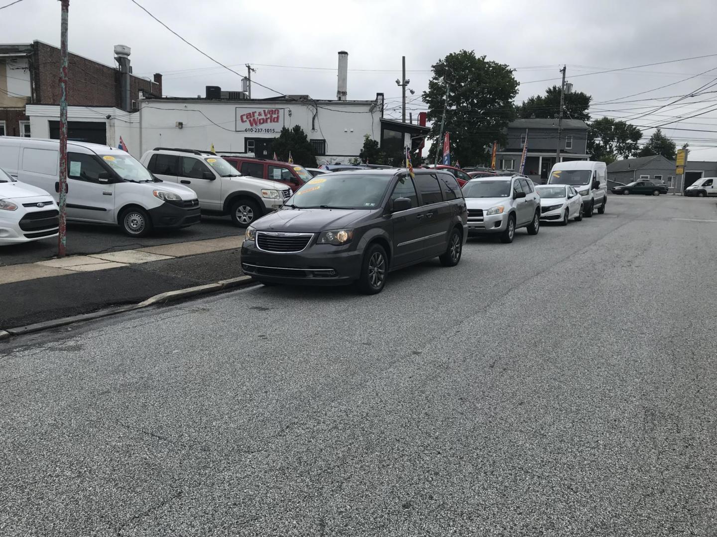 2015 Gray /Black Chrysler Town & Country S (2C4RC1HG6FR) with an 3.6L V6 DOHC 24V engine, 6-Speed Automatic transmission, located at 577 Chester Pike, Prospect Park, PA, 19076, (610) 237-1015, 39.886154, -75.302338 - 2015 Chrysler Town & Country S: Only 95k miles, DVD Player, stow and go seating, backup camera, new PA inspection, runs LIKE NEW! This vehicle comes inspected and has been given a bumper to bumper safety check. It is very clean, reliable, and well maintained. We offer a unique pay plan that is kn - Photo#1