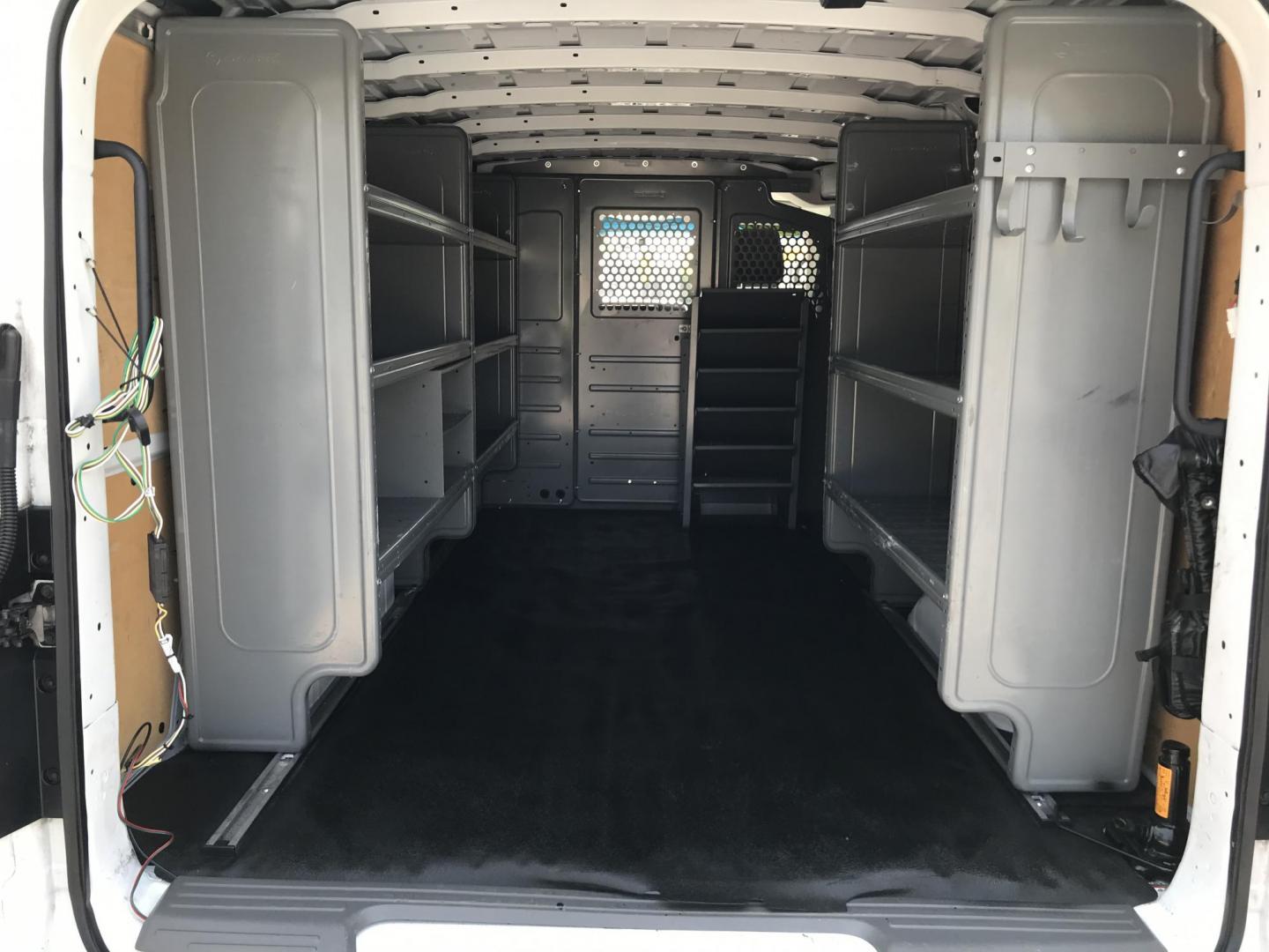 2020 White /Gray Nissan NV Cargo 1500 SV (1N6BF0KM9LN) with an 4.0L V6 engine, 5A transmission, located at 577 Chester Pike, Prospect Park, PA, 19076, (610) 237-1015, 39.886154, -75.302338 - 2020 Nissan NV 1500: No side or rear windows, backup camera, new PA inspection, shelving, FLEET MAINTAINED, runs LIKE NEW! This vehicle comes inspected and has been given a bumper to bumper safety check. It is very clean, reliable, and well maintained. We offer a unique pay plan that is known for - Photo#18