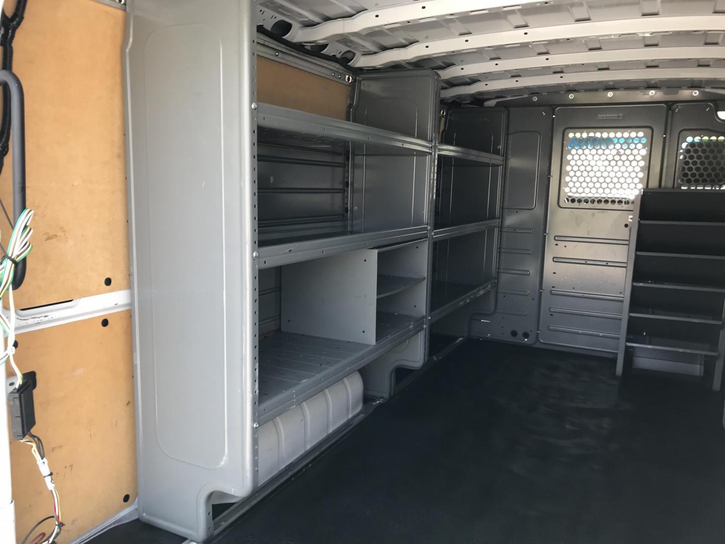 2020 White /Gray Nissan NV Cargo 1500 SV (1N6BF0KM9LN) with an 4.0L V6 engine, 5A transmission, located at 577 Chester Pike, Prospect Park, PA, 19076, (610) 237-1015, 39.886154, -75.302338 - 2020 Nissan NV 1500: No side or rear windows, backup camera, new PA inspection, shelving, FLEET MAINTAINED, runs LIKE NEW! This vehicle comes inspected and has been given a bumper to bumper safety check. It is very clean, reliable, and well maintained. We offer a unique pay plan that is known for - Photo#19