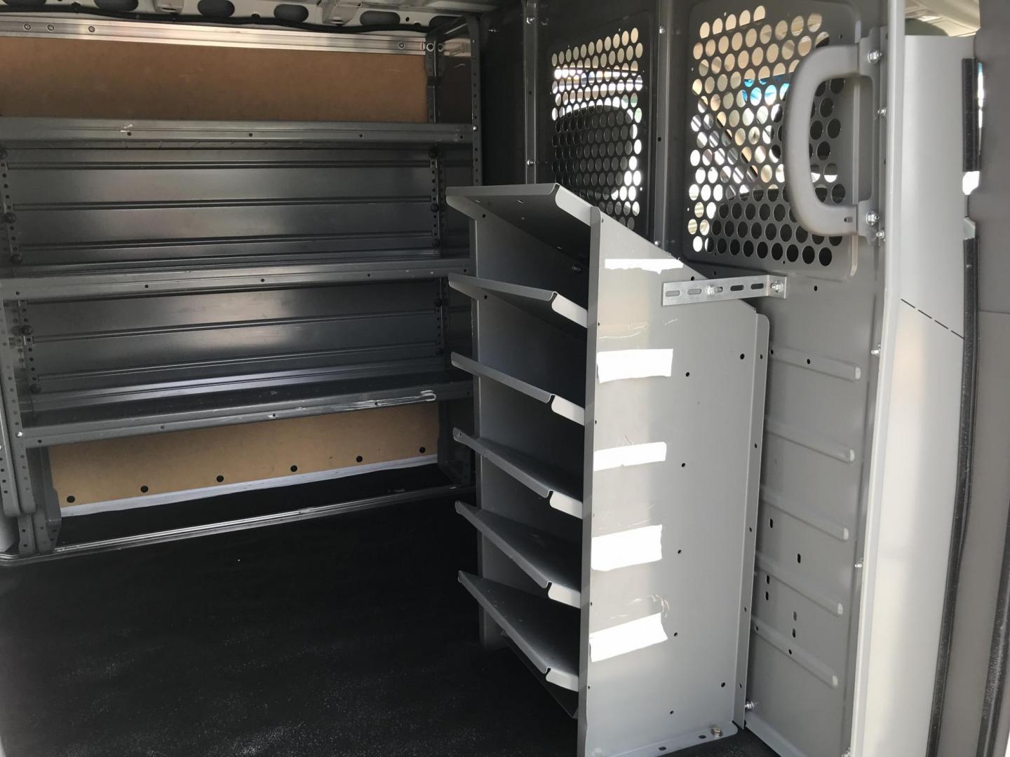 2020 White /Gray Nissan NV Cargo 1500 SV (1N6BF0KM9LN) with an 4.0L V6 engine, 5A transmission, located at 577 Chester Pike, Prospect Park, PA, 19076, (610) 237-1015, 39.886154, -75.302338 - 2020 Nissan NV 1500: No side or rear windows, backup camera, new PA inspection, shelving, FLEET MAINTAINED, runs LIKE NEW! This vehicle comes inspected and has been given a bumper to bumper safety check. It is very clean, reliable, and well maintained. We offer a unique pay plan that is known for - Photo#21