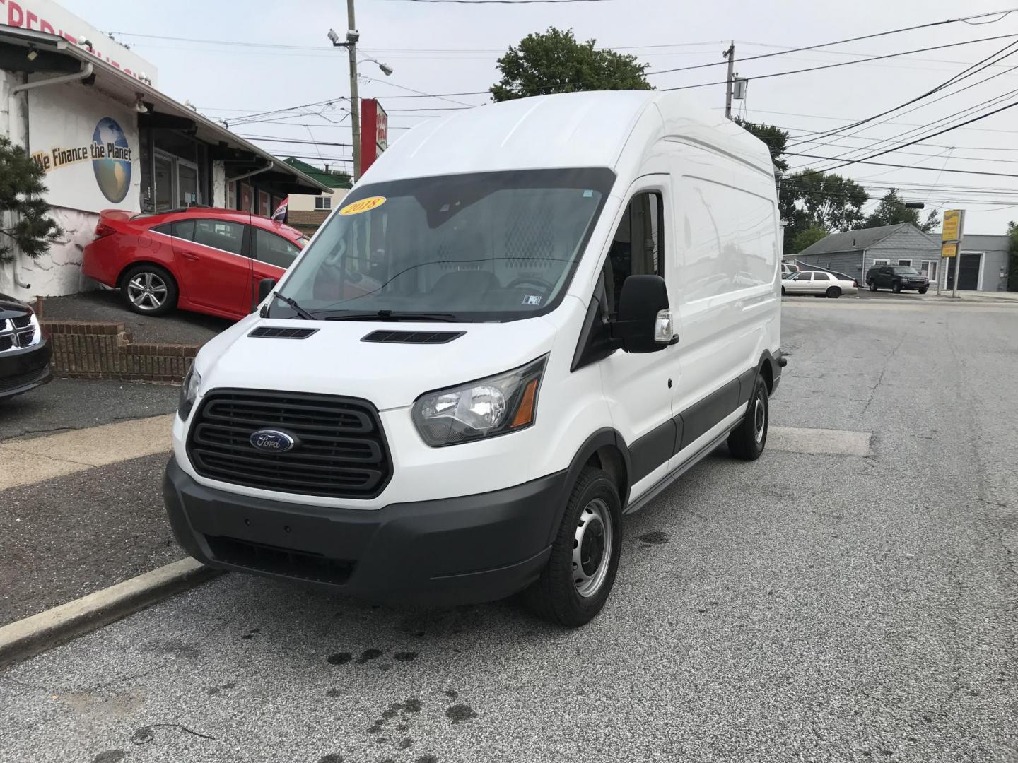 2018 White /Gray Ford Transit 350 Van High Roof w/Sliding Pass. 148-in. WB (1FTBW2XM7JK) with an 3.7L V6 DOHC 24V engine, 6A transmission, located at 577 Chester Pike, Prospect Park, PA, 19076, (610) 237-1015, 39.886154, -75.302338 - Photo#2