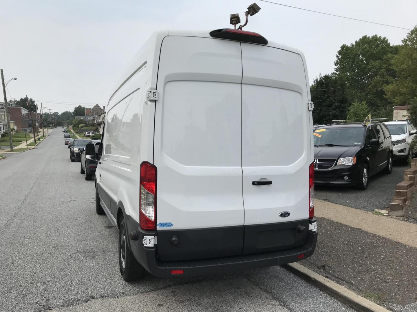 2018 White /Gray Ford Transit 350 Van High Roof w/Sliding Pass. 148-in. WB (1FTBW2XM7JK) with an 3.7L V6 DOHC 24V engine, 6A transmission, located at 577 Chester Pike, Prospect Park, PA, 19076, (610) 237-1015, 39.886154, -75.302338 - Photo#5