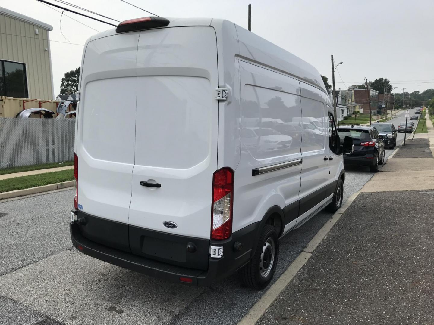 2018 White /Gray Ford Transit 350 Van High Roof w/Sliding Pass. 148-in. WB (1FTBW2XM7JK) with an 3.7L V6 DOHC 24V engine, 6A transmission, located at 577 Chester Pike, Prospect Park, PA, 19076, (610) 237-1015, 39.886154, -75.302338 - Photo#4