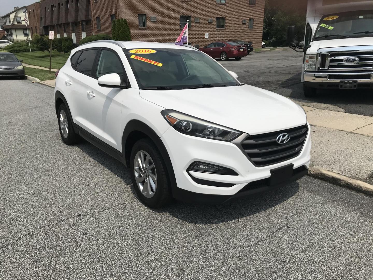 2016 White /Tan Hyundai Tucson SE w/Preferred Package AWD (KM8J3CA43GU) with an 2.0L L4 DOHC 16V engine, 6A transmission, located at 577 Chester Pike, Prospect Park, PA, 19076, (610) 237-1015, 39.886154, -75.302338 - 2016 Hyundai Tuscon: AWD, backup camera, new PA inspection, great on gas, SUPER CLEAN, runs LIKE NEW! This vehicle comes inspected and has been given a bumper to bumper safety check. It is very clean, reliable, and well maintained. We offer a unique pay plan that is known for being the easiest an - Photo#2