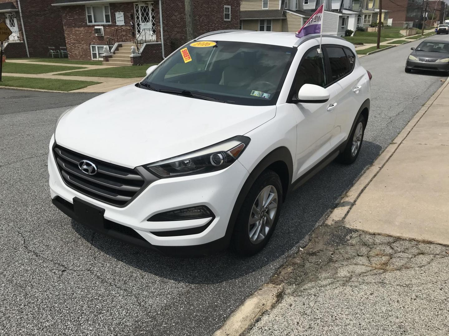 2016 White /Tan Hyundai Tucson SE w/Preferred Package AWD (KM8J3CA43GU) with an 2.0L L4 DOHC 16V engine, 6A transmission, located at 577 Chester Pike, Prospect Park, PA, 19076, (610) 237-1015, 39.886154, -75.302338 - 2016 Hyundai Tuscon: AWD, backup camera, new PA inspection, great on gas, SUPER CLEAN, runs LIKE NEW! This vehicle comes inspected and has been given a bumper to bumper safety check. It is very clean, reliable, and well maintained. We offer a unique pay plan that is known for being the easiest an - Photo#3