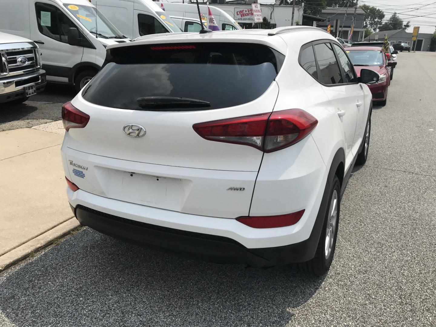 2016 White /Tan Hyundai Tucson SE w/Preferred Package AWD (KM8J3CA43GU) with an 2.0L L4 DOHC 16V engine, 6A transmission, located at 577 Chester Pike, Prospect Park, PA, 19076, (610) 237-1015, 39.886154, -75.302338 - 2016 Hyundai Tuscon: AWD, backup camera, new PA inspection, great on gas, SUPER CLEAN, runs LIKE NEW! This vehicle comes inspected and has been given a bumper to bumper safety check. It is very clean, reliable, and well maintained. We offer a unique pay plan that is known for being the easiest an - Photo#6