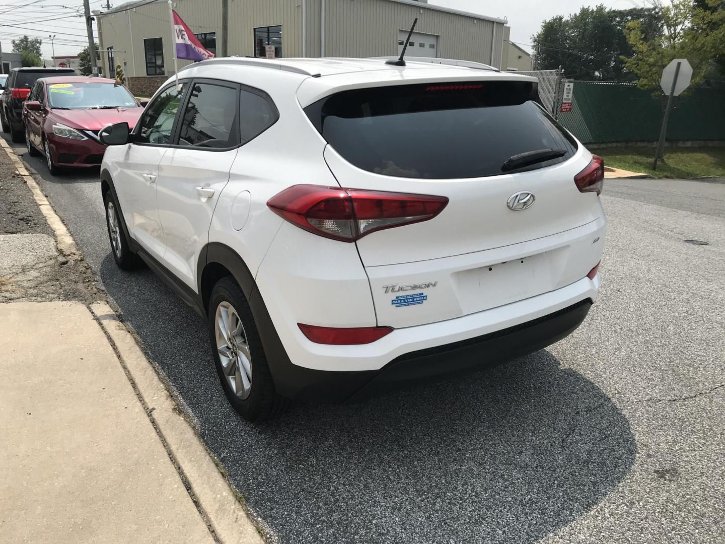 2016 White /Tan Hyundai Tucson SE w/Preferred Package AWD (KM8J3CA43GU) with an 2.0L L4 DOHC 16V engine, 6A transmission, located at 577 Chester Pike, Prospect Park, PA, 19076, (610) 237-1015, 39.886154, -75.302338 - 2016 Hyundai Tuscon: AWD, backup camera, new PA inspection, great on gas, SUPER CLEAN, runs LIKE NEW! This vehicle comes inspected and has been given a bumper to bumper safety check. It is very clean, reliable, and well maintained. We offer a unique pay plan that is known for being the easiest an - Photo#5