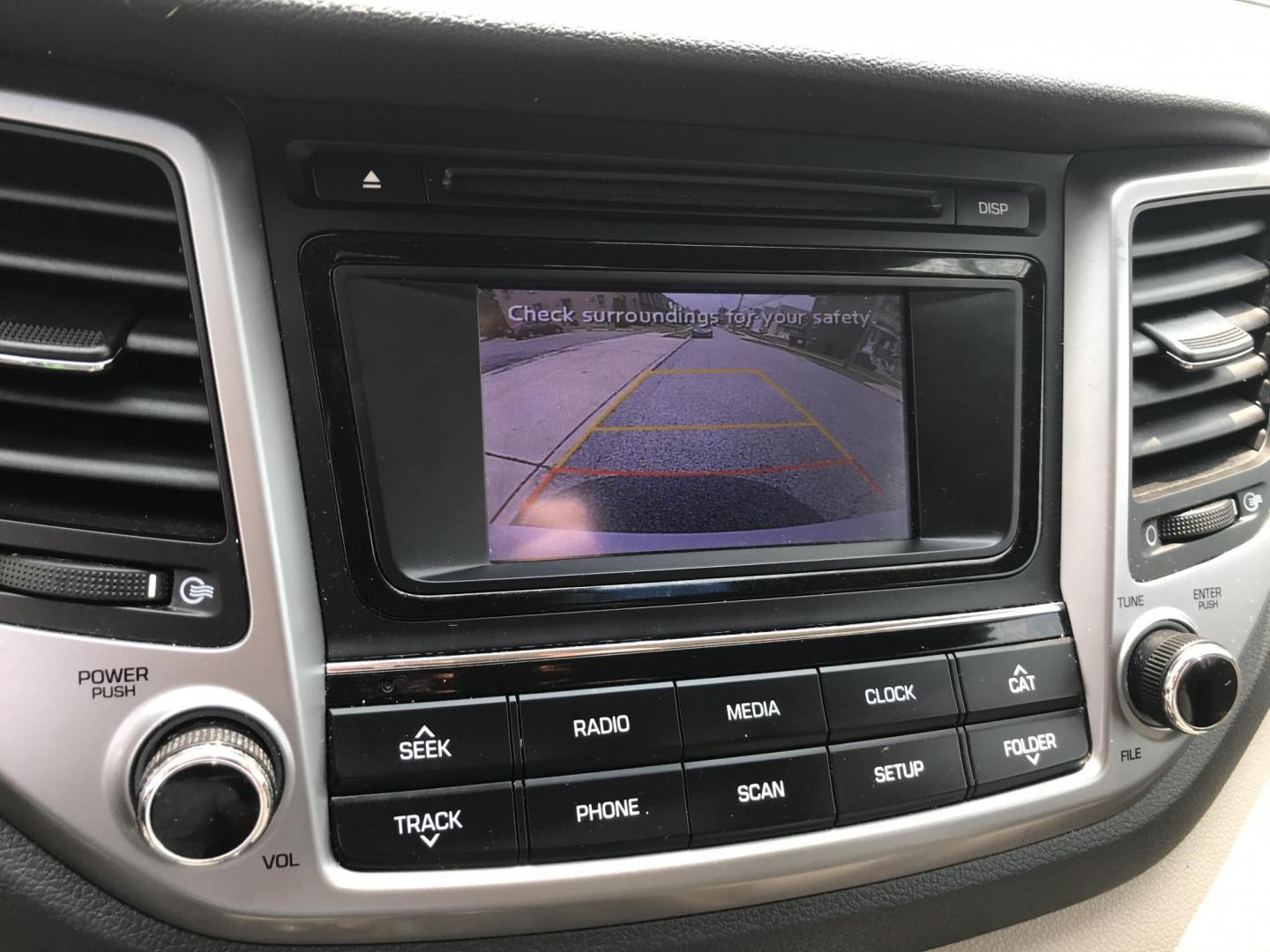 2016 White /Tan Hyundai Tucson SE w/Preferred Package AWD (KM8J3CA43GU) with an 2.0L L4 DOHC 16V engine, 6A transmission, located at 577 Chester Pike, Prospect Park, PA, 19076, (610) 237-1015, 39.886154, -75.302338 - 2016 Hyundai Tuscon: AWD, backup camera, new PA inspection, great on gas, SUPER CLEAN, runs LIKE NEW! This vehicle comes inspected and has been given a bumper to bumper safety check. It is very clean, reliable, and well maintained. We offer a unique pay plan that is known for being the easiest an - Photo#14
