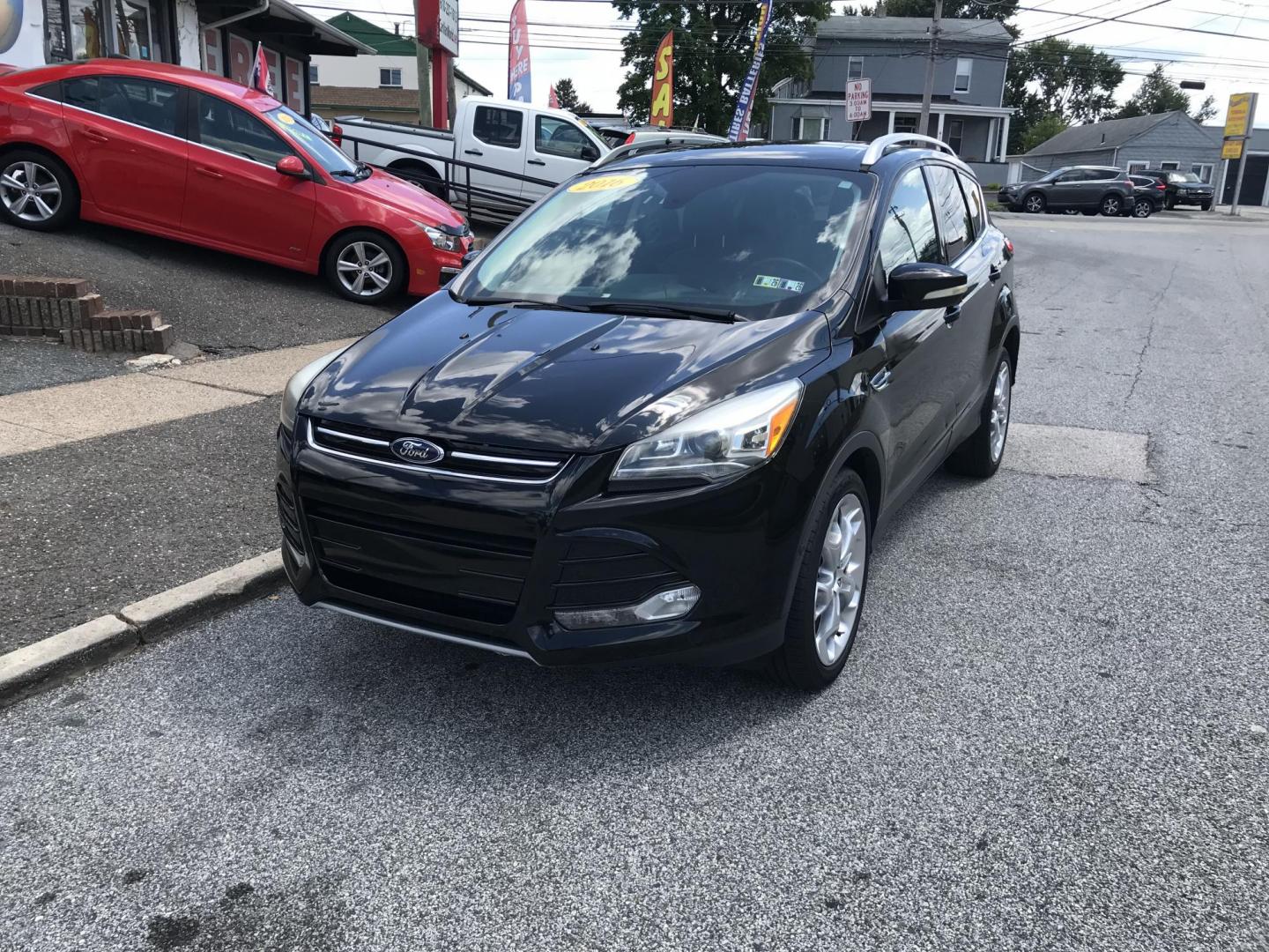 2016 Black /Black Ford Escape Titanium 4WD (1FMCU9JX2GU) with an 1.6L L4 DOHC 16V engine, 6-Speed Automatic transmission, located at 577 Chester Pike, Prospect Park, PA, 19076, (610) 237-1015, 39.886154, -75.302338 - 2016 Ford Escape Titanium: Only 106k miles, backup camera, sunroof, new PA inspection, SUPER CLEAN, runs LIKE NEW! This vehicle comes inspected and has been given a bumper to bumper safety check. It is very clean, reliable, and well maintained. We offer a unique pay plan that is known for being t - Photo#2
