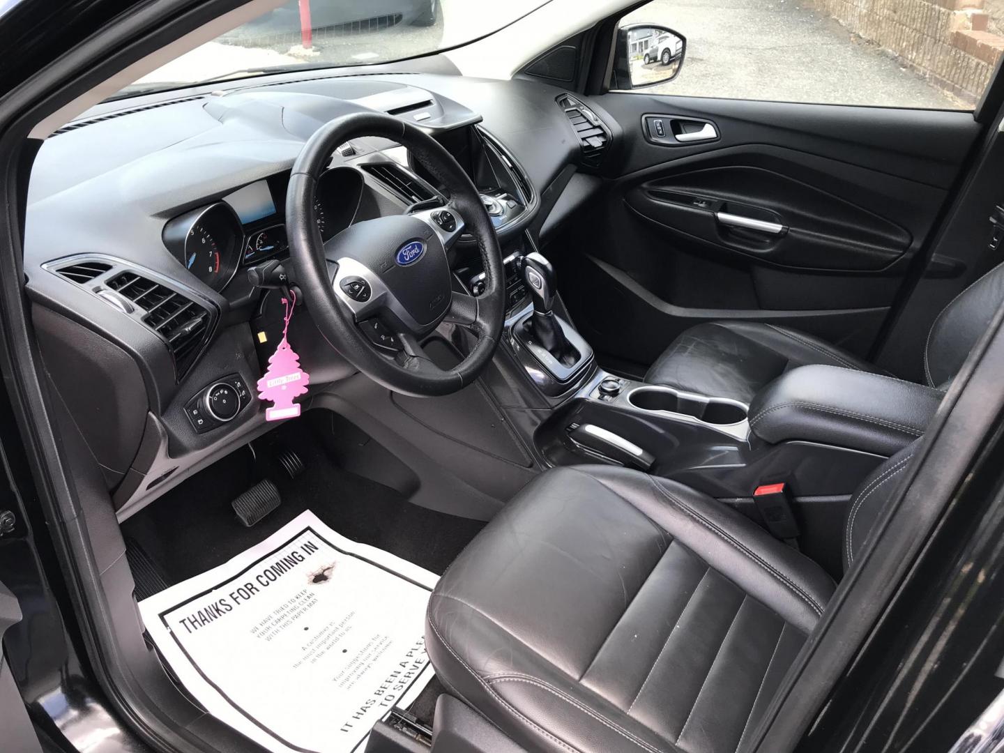 2016 Black /Black Ford Escape Titanium 4WD (1FMCU9JX2GU) with an 1.6L L4 DOHC 16V engine, 6-Speed Automatic transmission, located at 577 Chester Pike, Prospect Park, PA, 19076, (610) 237-1015, 39.886154, -75.302338 - 2016 Ford Escape Titanium: Only 106k miles, backup camera, sunroof, new PA inspection, SUPER CLEAN, runs LIKE NEW! This vehicle comes inspected and has been given a bumper to bumper safety check. It is very clean, reliable, and well maintained. We offer a unique pay plan that is known for being t - Photo#9