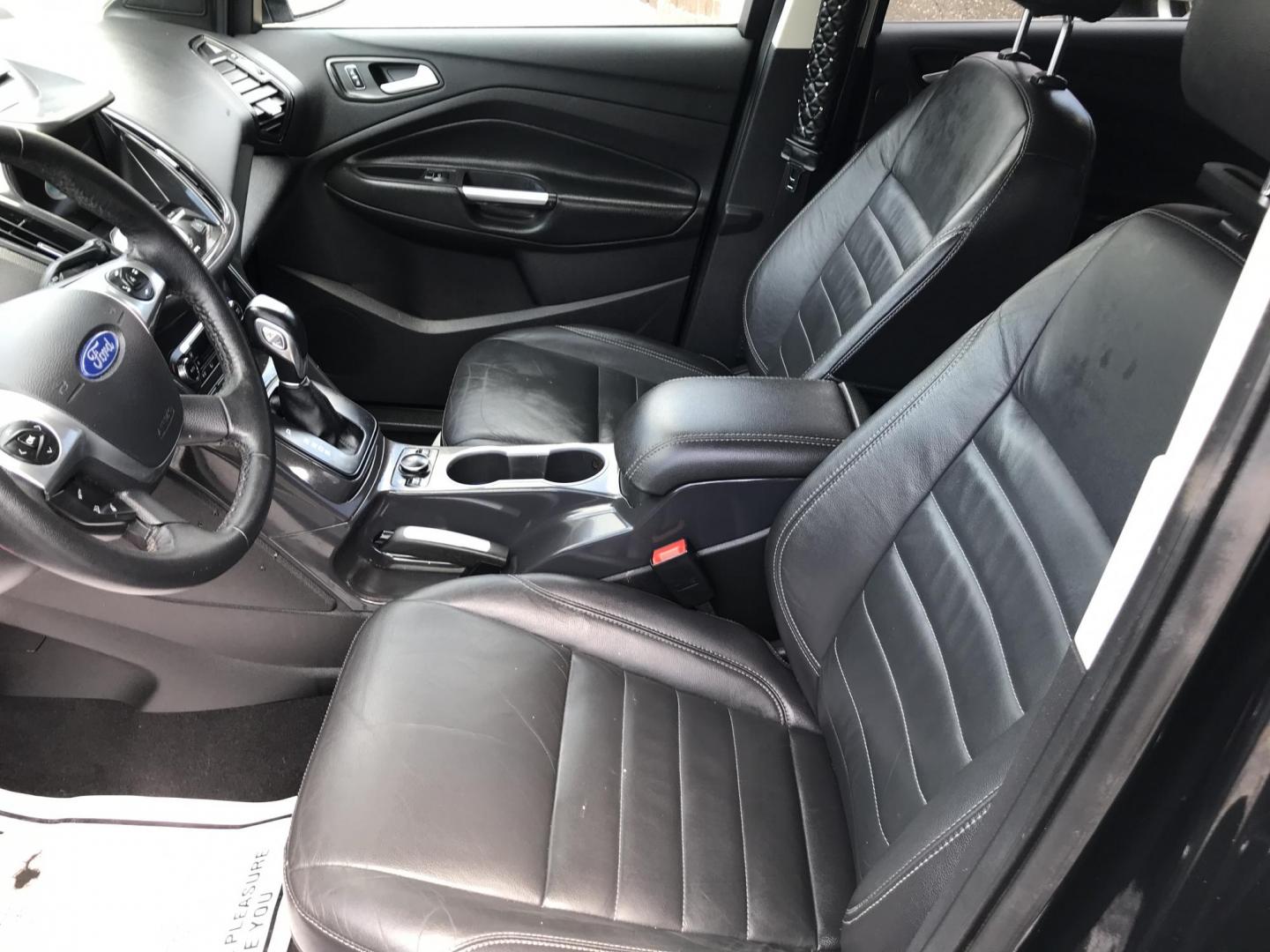 2016 Black /Black Ford Escape Titanium 4WD (1FMCU9JX2GU) with an 1.6L L4 DOHC 16V engine, 6-Speed Automatic transmission, located at 577 Chester Pike, Prospect Park, PA, 19076, (610) 237-1015, 39.886154, -75.302338 - 2016 Ford Escape Titanium: Only 106k miles, backup camera, sunroof, new PA inspection, SUPER CLEAN, runs LIKE NEW! This vehicle comes inspected and has been given a bumper to bumper safety check. It is very clean, reliable, and well maintained. We offer a unique pay plan that is known for being t - Photo#11