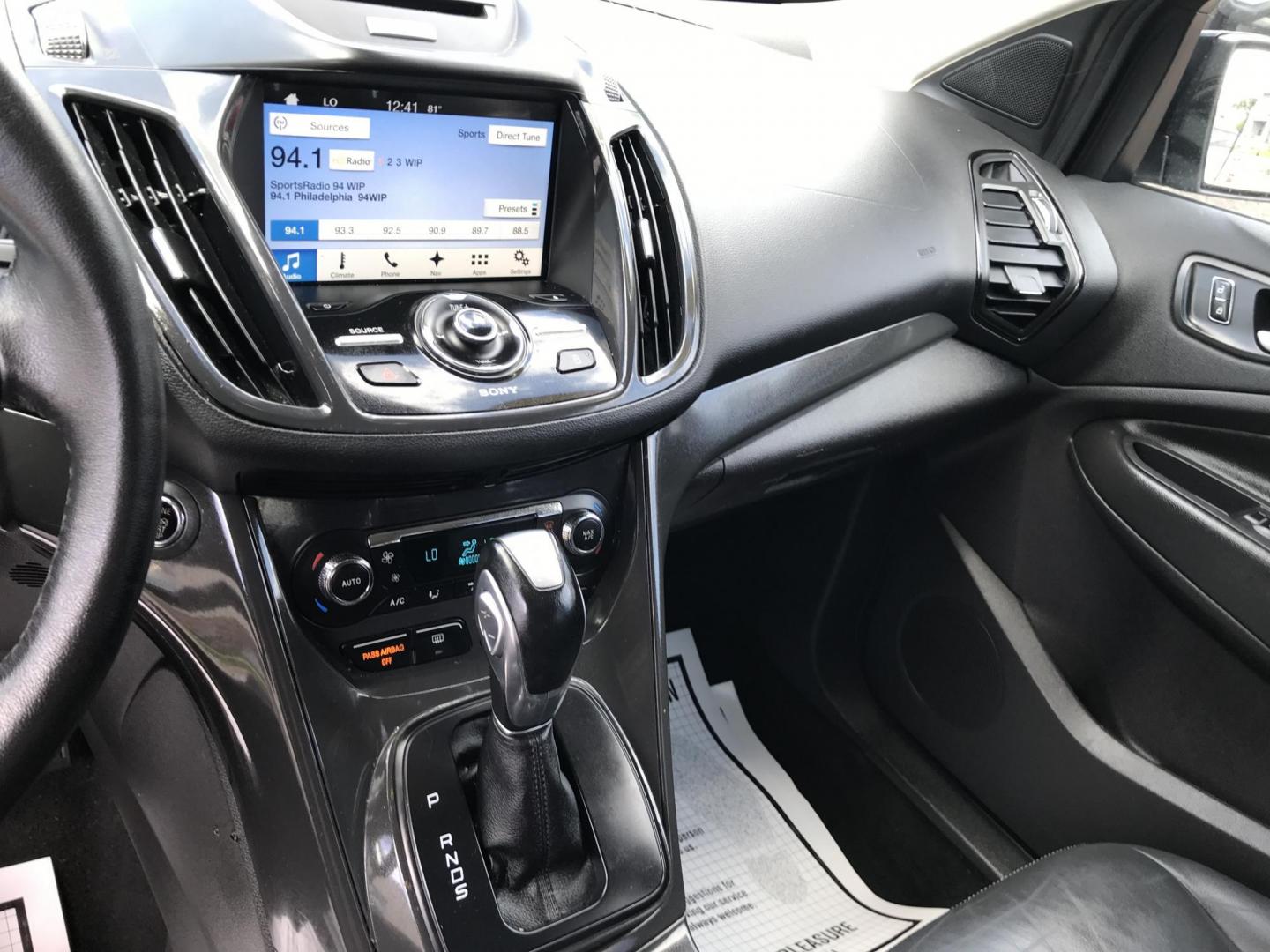 2016 Black /Black Ford Escape Titanium 4WD (1FMCU9JX2GU) with an 1.6L L4 DOHC 16V engine, 6-Speed Automatic transmission, located at 577 Chester Pike, Prospect Park, PA, 19076, (610) 237-1015, 39.886154, -75.302338 - 2016 Ford Escape Titanium: Only 106k miles, backup camera, sunroof, new PA inspection, SUPER CLEAN, runs LIKE NEW! This vehicle comes inspected and has been given a bumper to bumper safety check. It is very clean, reliable, and well maintained. We offer a unique pay plan that is known for being t - Photo#14