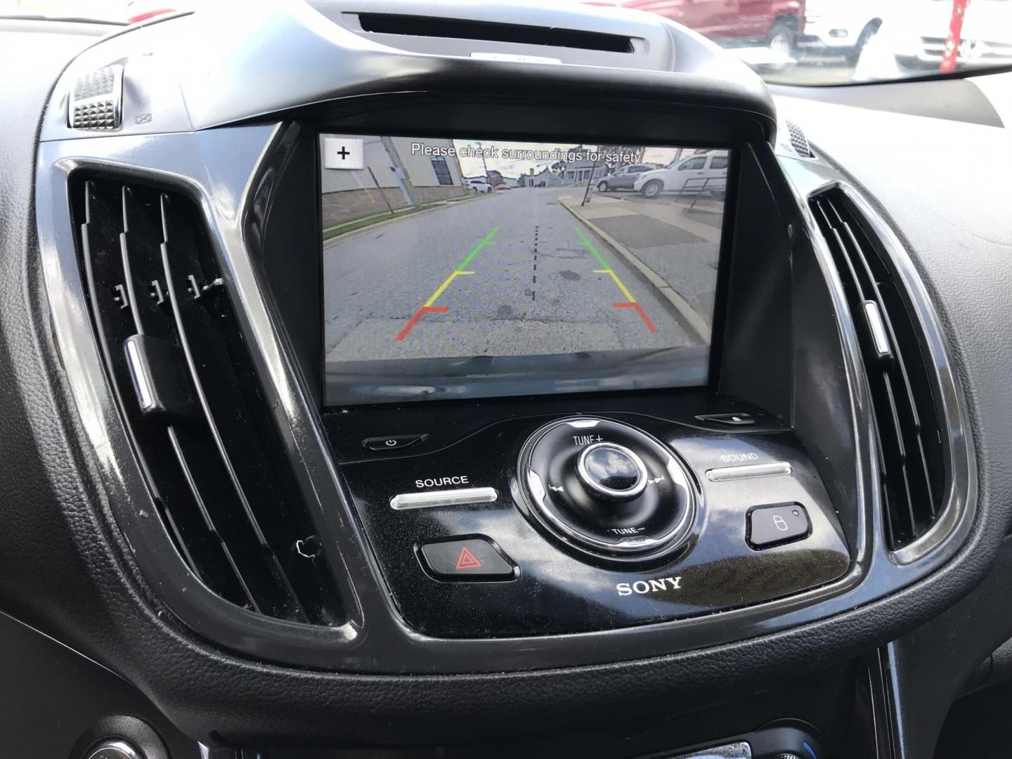 2016 Black /Black Ford Escape Titanium 4WD (1FMCU9JX2GU) with an 1.6L L4 DOHC 16V engine, 6-Speed Automatic transmission, located at 577 Chester Pike, Prospect Park, PA, 19076, (610) 237-1015, 39.886154, -75.302338 - 2016 Ford Escape Titanium: Only 106k miles, backup camera, sunroof, new PA inspection, SUPER CLEAN, runs LIKE NEW! This vehicle comes inspected and has been given a bumper to bumper safety check. It is very clean, reliable, and well maintained. We offer a unique pay plan that is known for being t - Photo#15