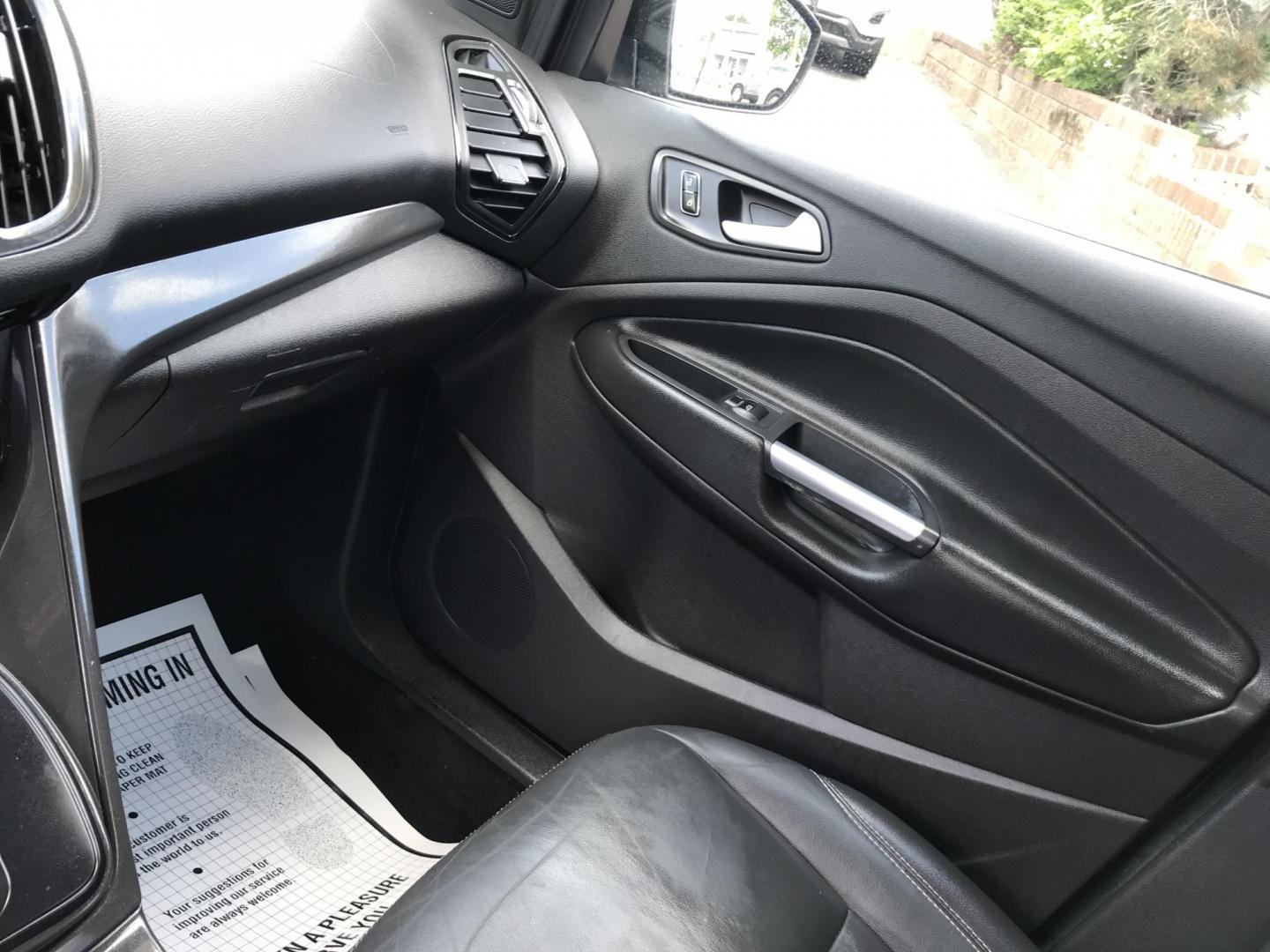 2016 Black /Black Ford Escape Titanium 4WD (1FMCU9JX2GU) with an 1.6L L4 DOHC 16V engine, 6-Speed Automatic transmission, located at 577 Chester Pike, Prospect Park, PA, 19076, (610) 237-1015, 39.886154, -75.302338 - 2016 Ford Escape Titanium: Only 106k miles, backup camera, sunroof, new PA inspection, SUPER CLEAN, runs LIKE NEW! This vehicle comes inspected and has been given a bumper to bumper safety check. It is very clean, reliable, and well maintained. We offer a unique pay plan that is known for being t - Photo#17