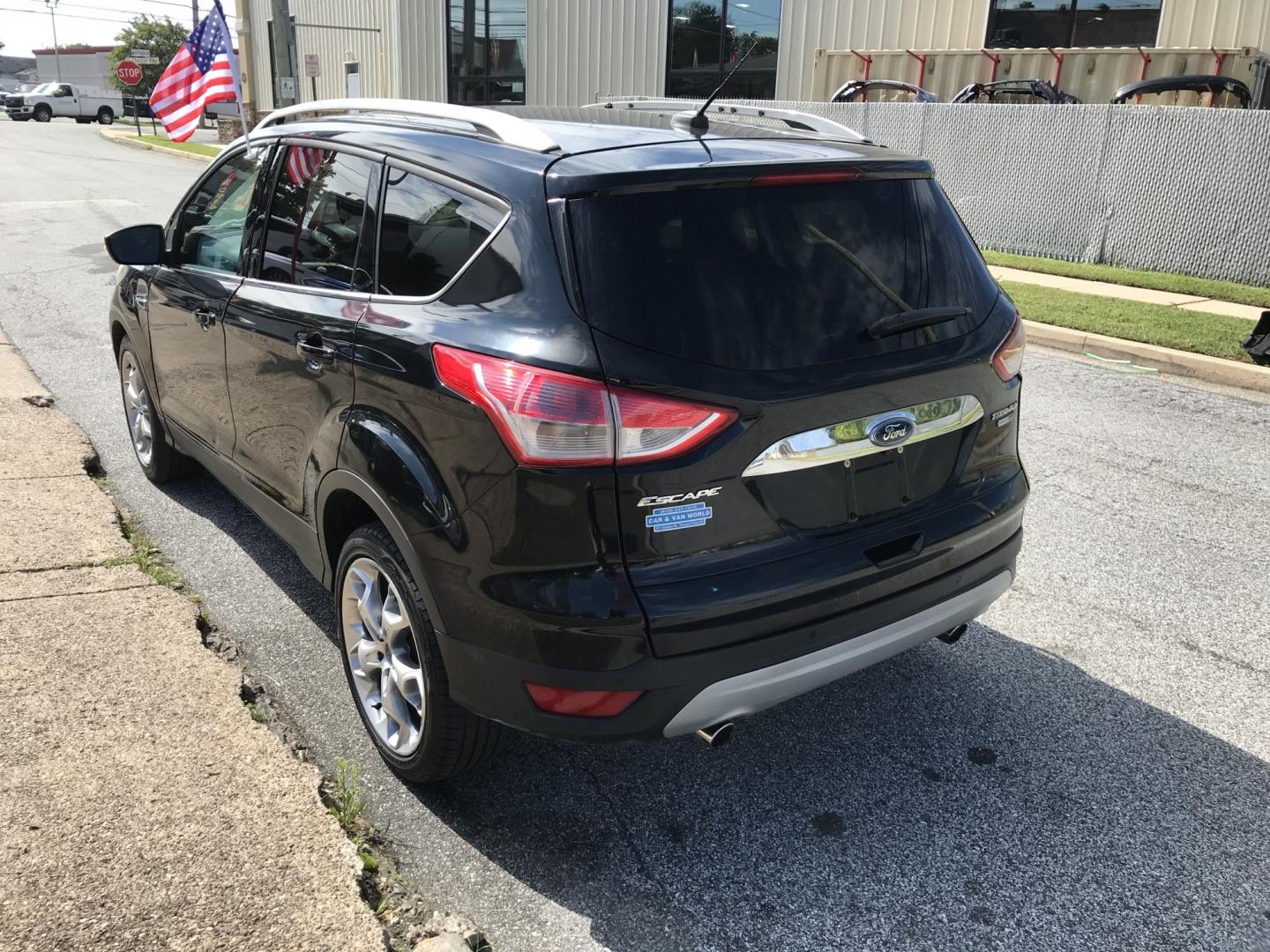 2016 Black /Black Ford Escape Titanium 4WD (1FMCU9JX2GU) with an 1.6L L4 DOHC 16V engine, 6-Speed Automatic transmission, located at 577 Chester Pike, Prospect Park, PA, 19076, (610) 237-1015, 39.886154, -75.302338 - 2016 Ford Escape Titanium: Only 109k miles, backup camera, sunroof, new PA inspection, SUPER CLEAN, runs LIKE NEW! This vehicle comes inspected and has been given a bumper to bumper safety check. It is very clean, reliable, and well maintained. We offer a unique pay plan that is known for being t- Photo#6