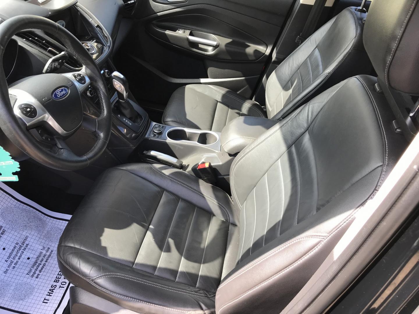 2016 Black /Black Ford Escape Titanium 4WD (1FMCU9JX2GU) with an 1.6L L4 DOHC 16V engine, 6-Speed Automatic transmission, located at 577 Chester Pike, Prospect Park, PA, 19076, (610) 237-1015, 39.886154, -75.302338 - 2016 Ford Escape Titanium: Only 109k miles, backup camera, sunroof, new PA inspection, SUPER CLEAN, runs LIKE NEW! This vehicle comes inspected and has been given a bumper to bumper safety check. It is very clean, reliable, and well maintained. We offer a unique pay plan that is known for being t- Photo#11