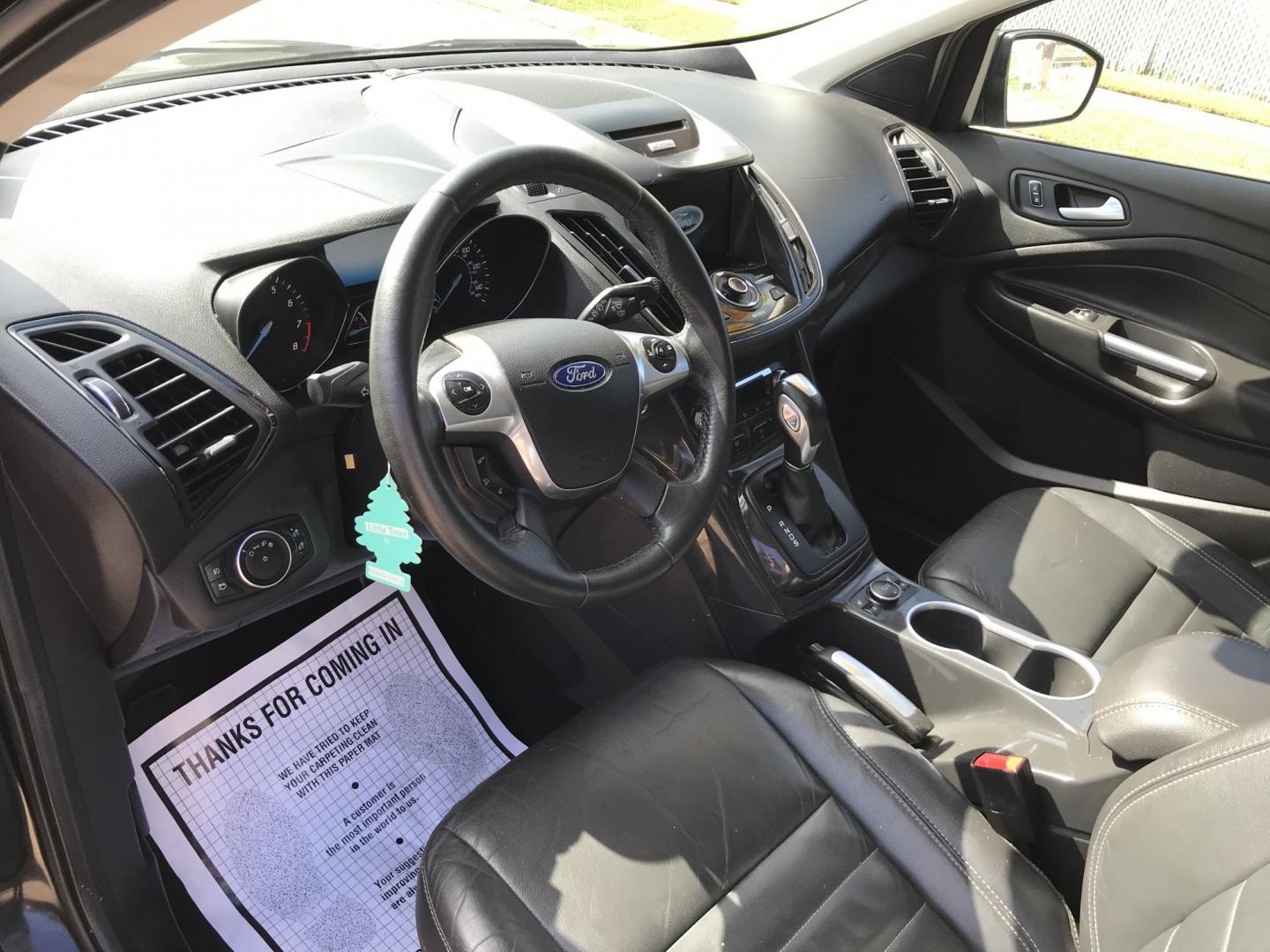 2016 Black /Black Ford Escape Titanium 4WD (1FMCU9JX2GU) with an 1.6L L4 DOHC 16V engine, 6-Speed Automatic transmission, located at 577 Chester Pike, Prospect Park, PA, 19076, (610) 237-1015, 39.886154, -75.302338 - 2016 Ford Escape Titanium: Only 109k miles, backup camera, sunroof, new PA inspection, SUPER CLEAN, runs LIKE NEW! This vehicle comes inspected and has been given a bumper to bumper safety check. It is very clean, reliable, and well maintained. We offer a unique pay plan that is known for being t- Photo#12